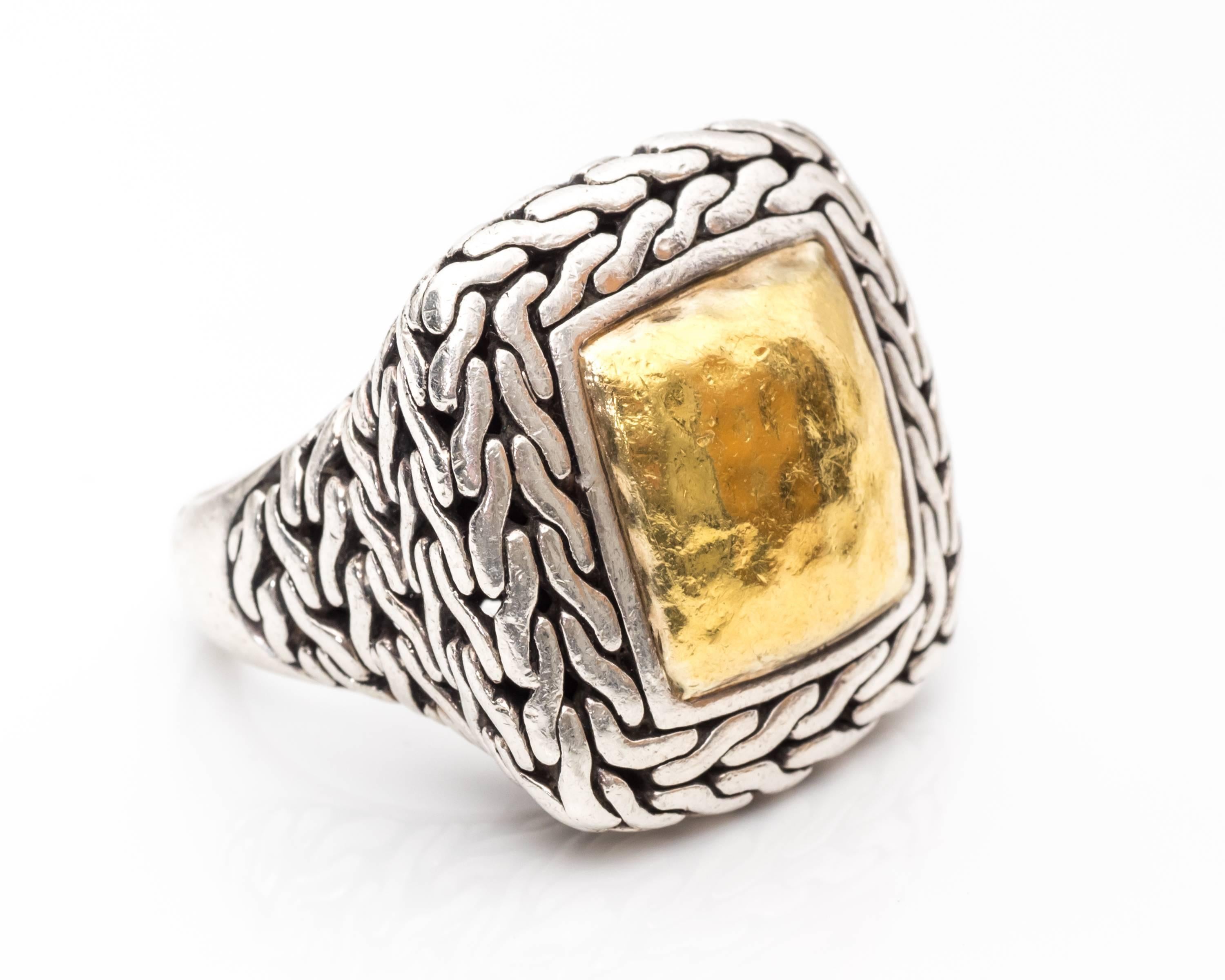 John Hardy Ring
Sterling Silver and 22 Karat Gold Ring
Unisex Design
Features Weave Twisted Pattern Design Halo Around Top Head and Shoulders of Shank
Hallmarked 
