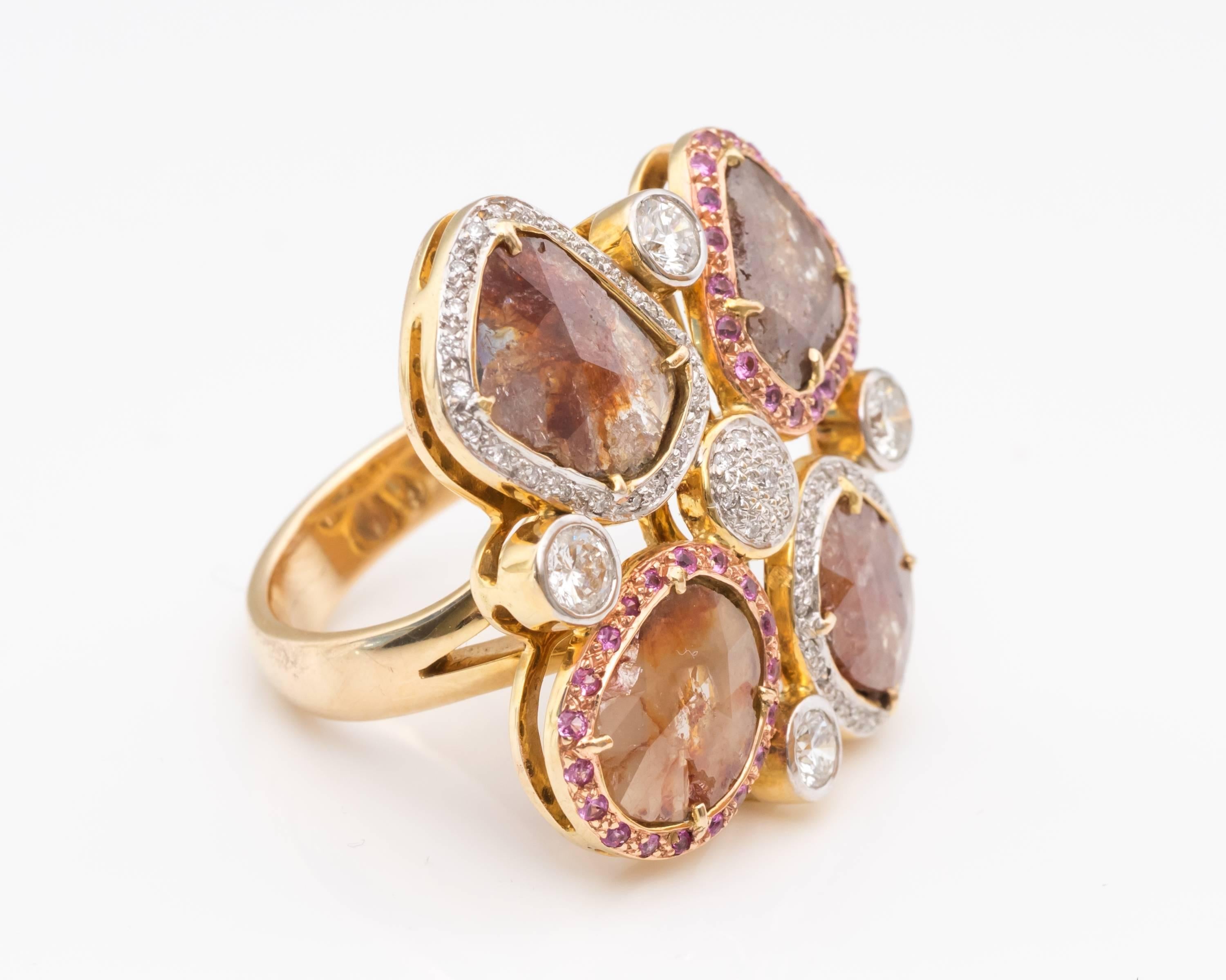 Butterfly Design Pattern Appearance
Beautiful Detailing on the Ring with Subtle Hues of Pinks, Rose Gold, Yellow Gold and Sparkling Diamonds
4 Carats of Diamond Slices
Included with Different Natural Minerals 
Accent Diamonds surrounding the diamond