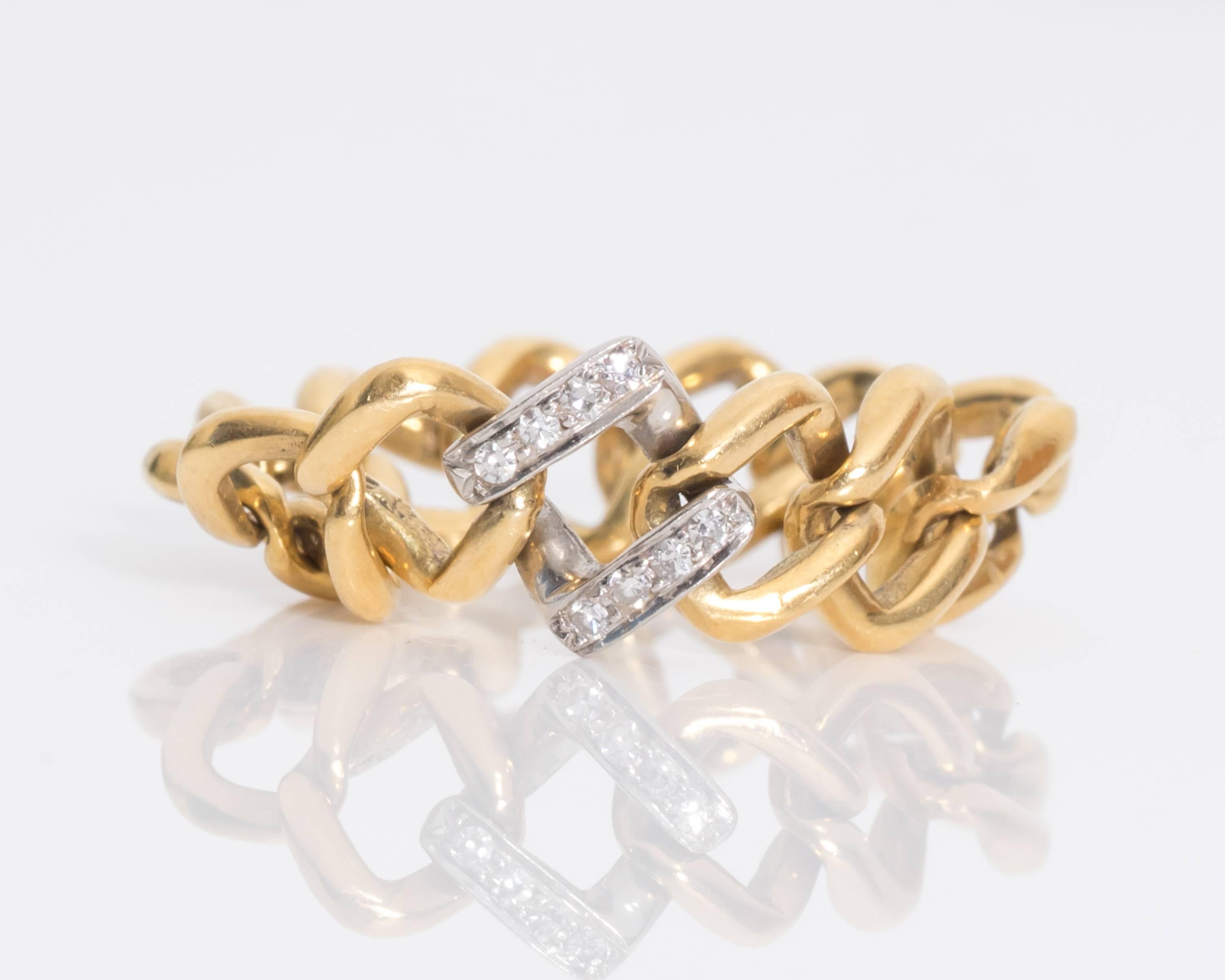 Beautiful Chain Link Ring from 1980s
Two-Tone Crafted - 18 Karat Yellow Gold and Platinum 
Features approximately 0.10 carats of Diamonds 
Fits Ring Size 5. It can be worn on any finger at any point, for example midi length or as a traditional ring.