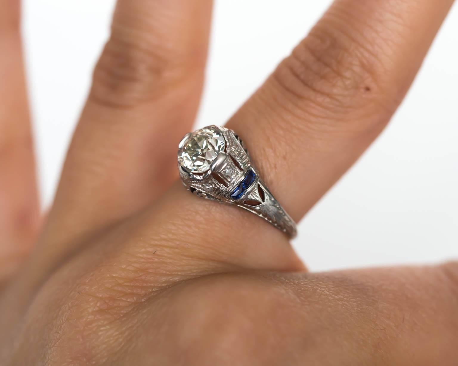Women's 1920s Art Deco Platinum 1.09 Carat Diamond Engagement Ring with Sapphires For Sale