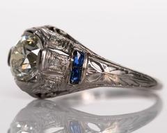 1920s Art Deco Platinum 1.09 Carat Diamond Engagement Ring with Sapphires