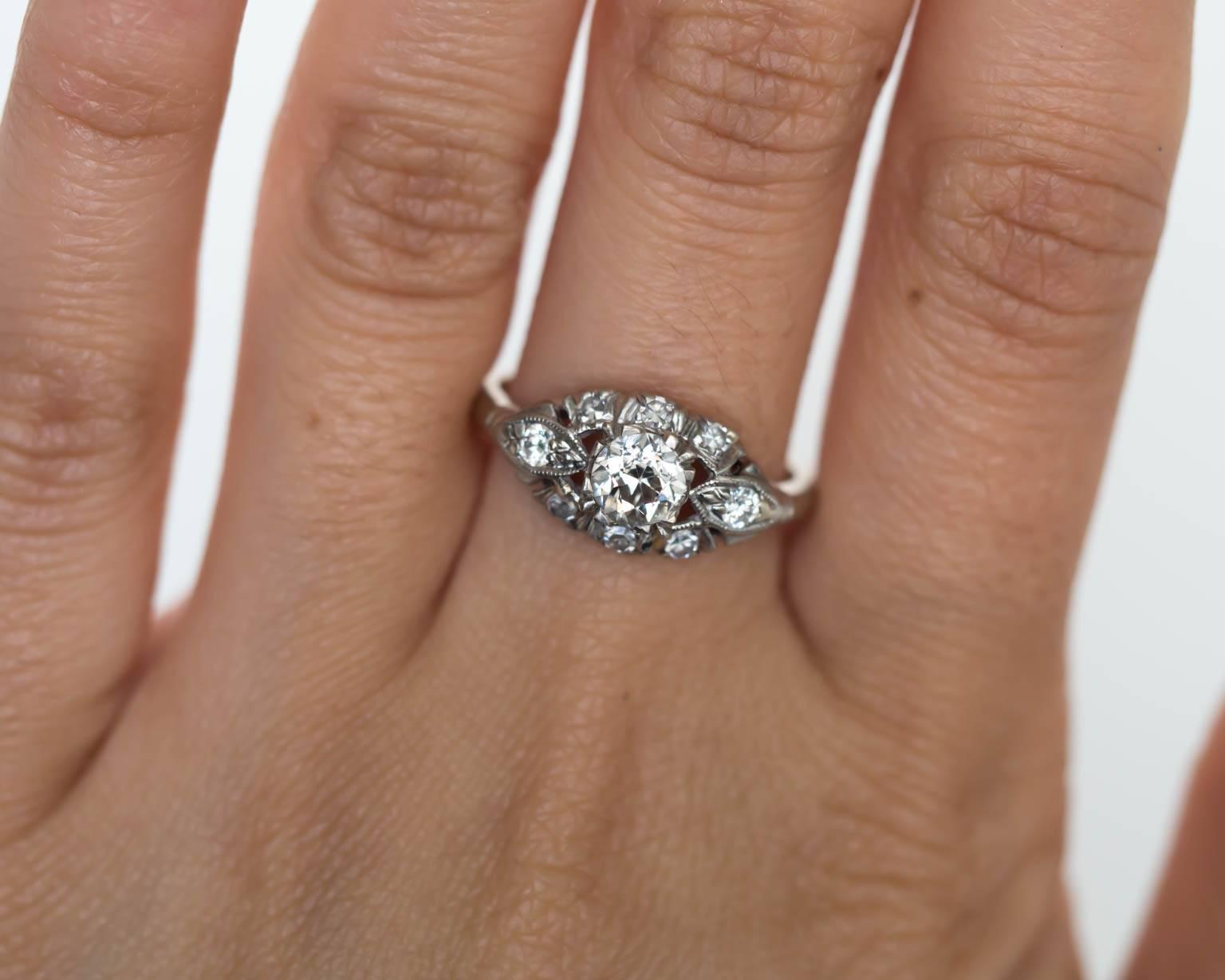 Women's 1920s Art Deco Platinum GIA Certified .53 Carat Diamond Engagement Ring For Sale
