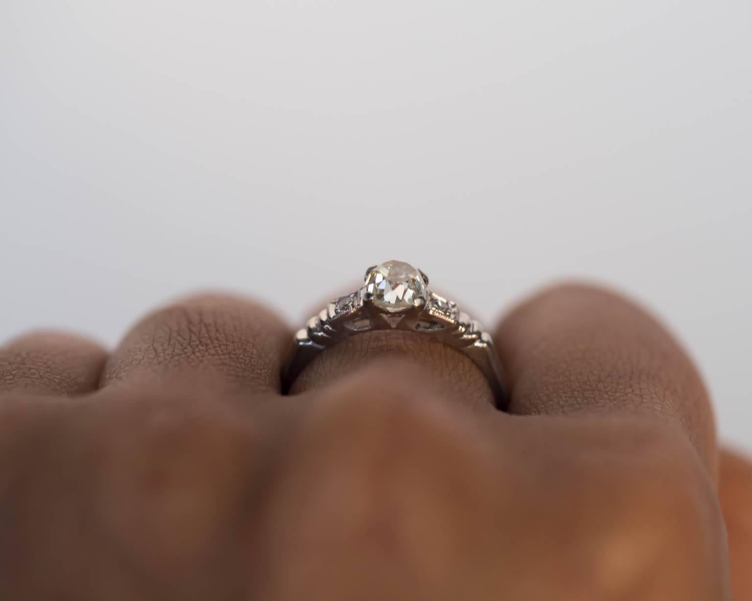 1920s Art Deco Platinum GIA Certified .71 Carat Diamond Engagement Ring For Sale 5