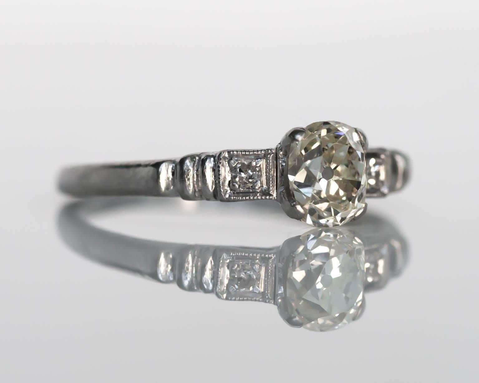 1920s Art Deco Platinum GIA Certified .71 Carat Diamond Engagement Ring In Excellent Condition For Sale In Atlanta, GA