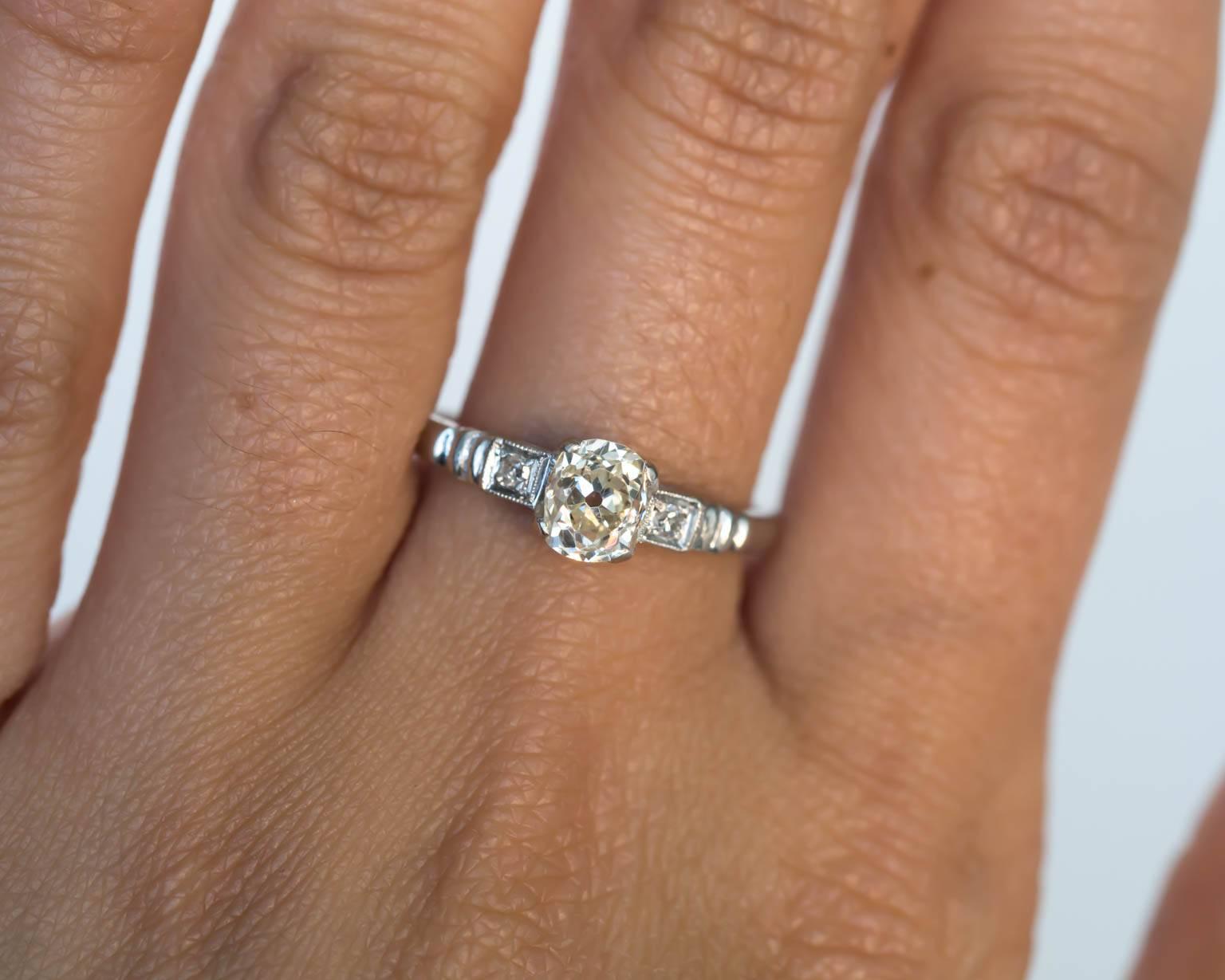 1920s Art Deco Platinum GIA Certified .71 Carat Diamond Engagement Ring For Sale 3