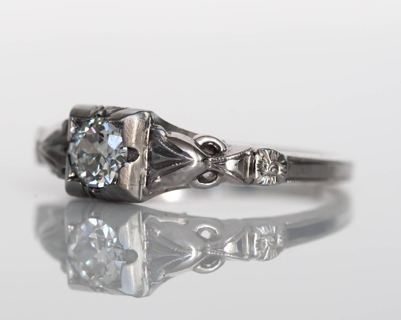Item Details: 
Ring Size: 6
Metal Type: 18 Karat White Gold 
Weight: 2.4 grams

Center Diamond Details:
Shape: Old European Cut
Carat Weight: .32 carat
Color: G
Clarity: VS1

Finger to Top of Stone Measurement: 4.72mm