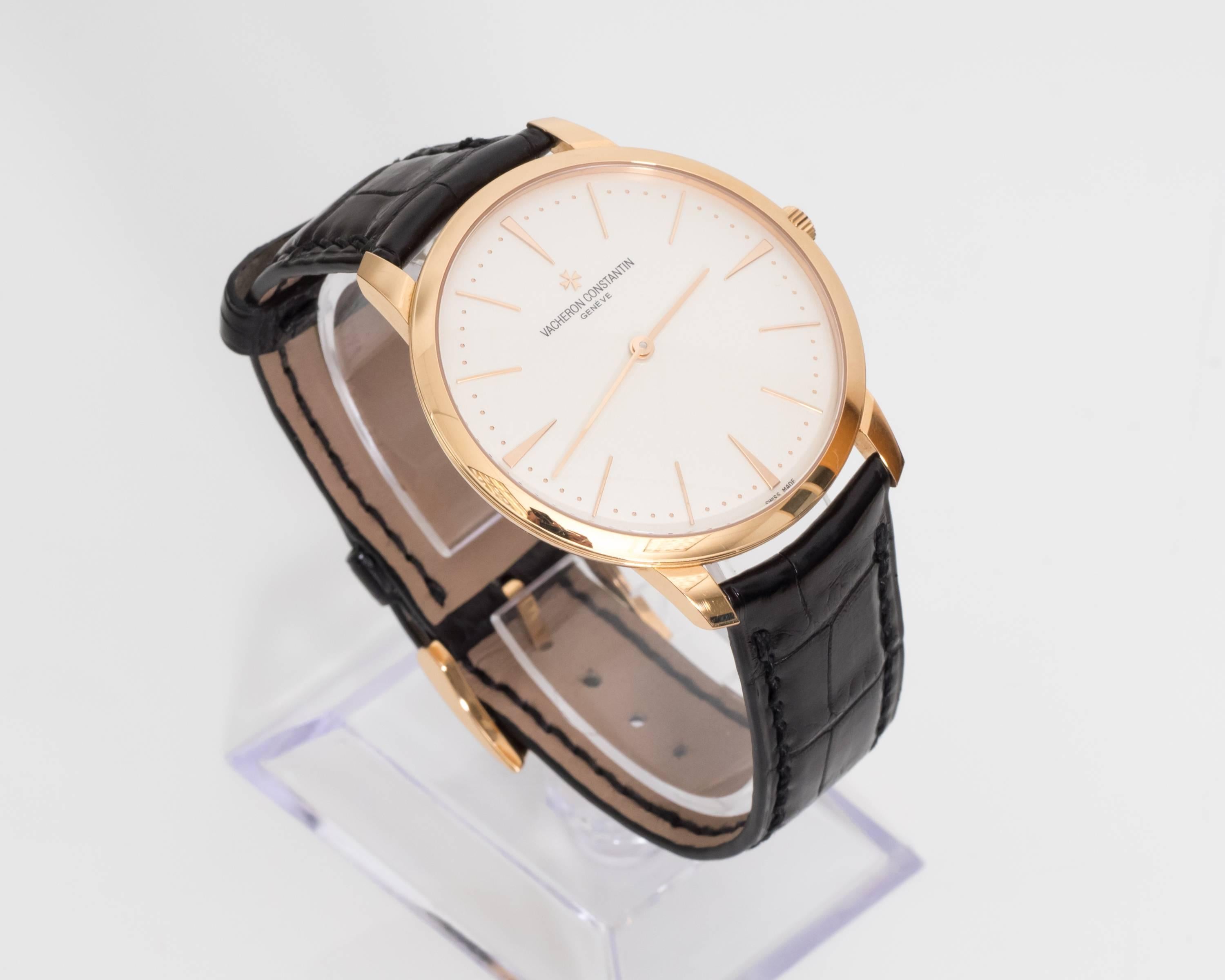 Vacheron Constantin Watch Crafted in 18 Karat Rose Gold Accents on Dial, Face and Markers.  This watch has a modern look with a ultra sleek finish that will last a lifetime! 

The hallmark "Vacheron Constantin Geneve 81180 1262438 Au750 SWISS