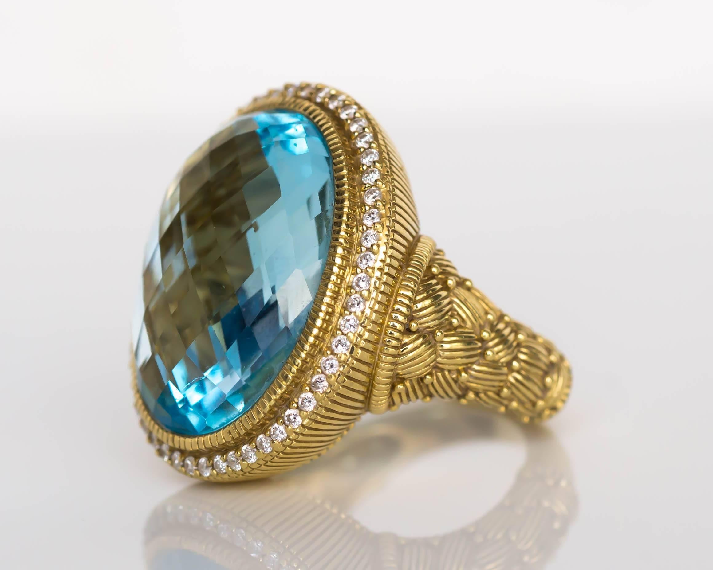 Item Details: 
Ring Size: 7
Metal Type: 18 Karat Yellow Gold
Weight: 18.6 grams

Color Stone Details: 
Type: London Blue Topaz (Checkerboard faceting)
Carat WeighT: 10 carat

Diamond Details:
Carat Weight: .40 carat, total weight
Color: D-E
Clarity: