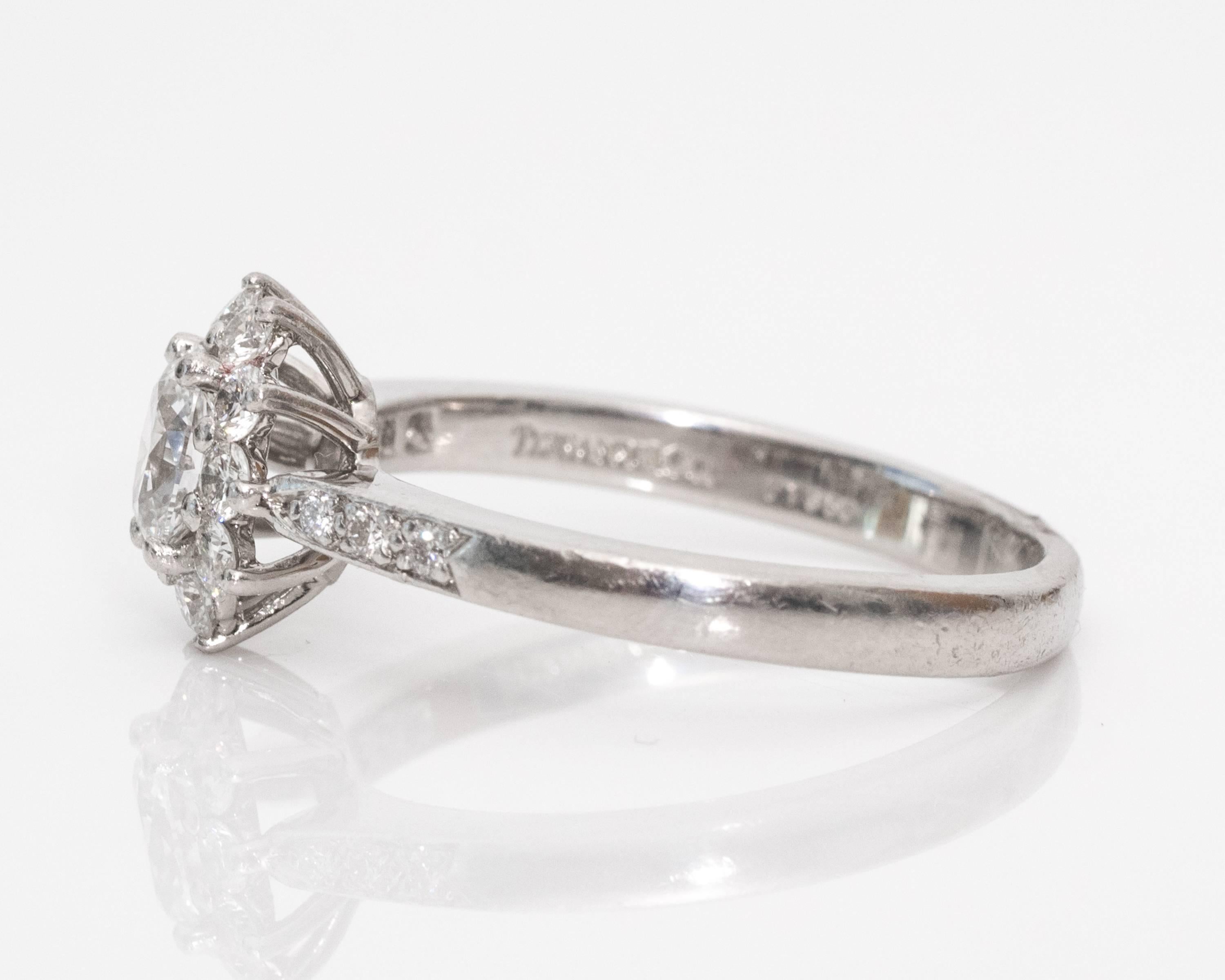 Tiffany & Co Engagement Ring Crafted in Platinum

This stunning engagement ring sparkles every which way with 17 diamonds total. The center stone is an oval shaped diamond with E color and VVS clarity. Few diamonds on the market can compare to this