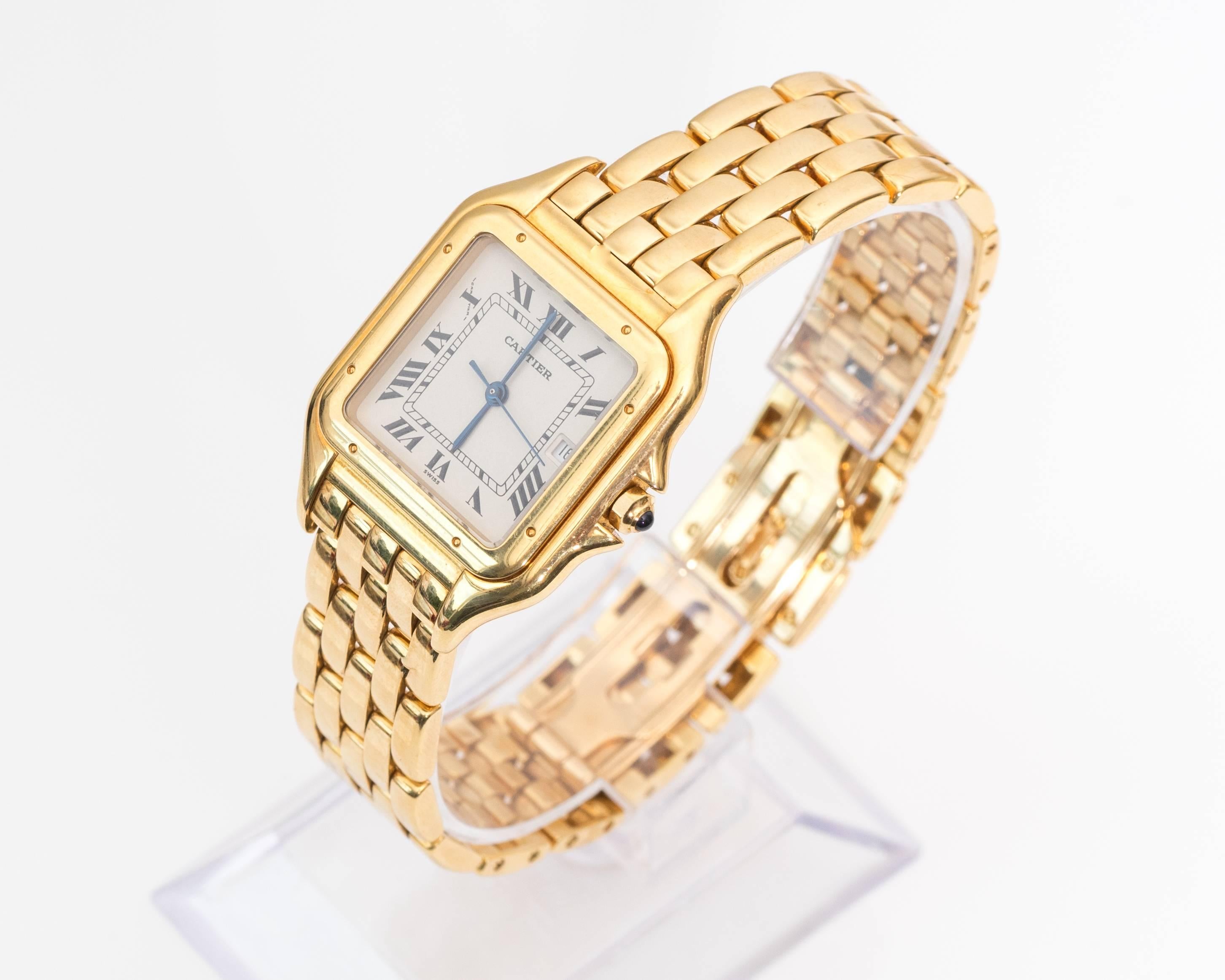 Cartier Wristwatch, 1980s
Medium Size
Panther Model
18 Karat Yellow Gold
Features 27mm x 38mm case with Domed Stepped Bezel secured by Screws
White Dial with Classic Cartier Roman Figures and Blued Steel Hands
Powered by Quartz Movement with Sweep
