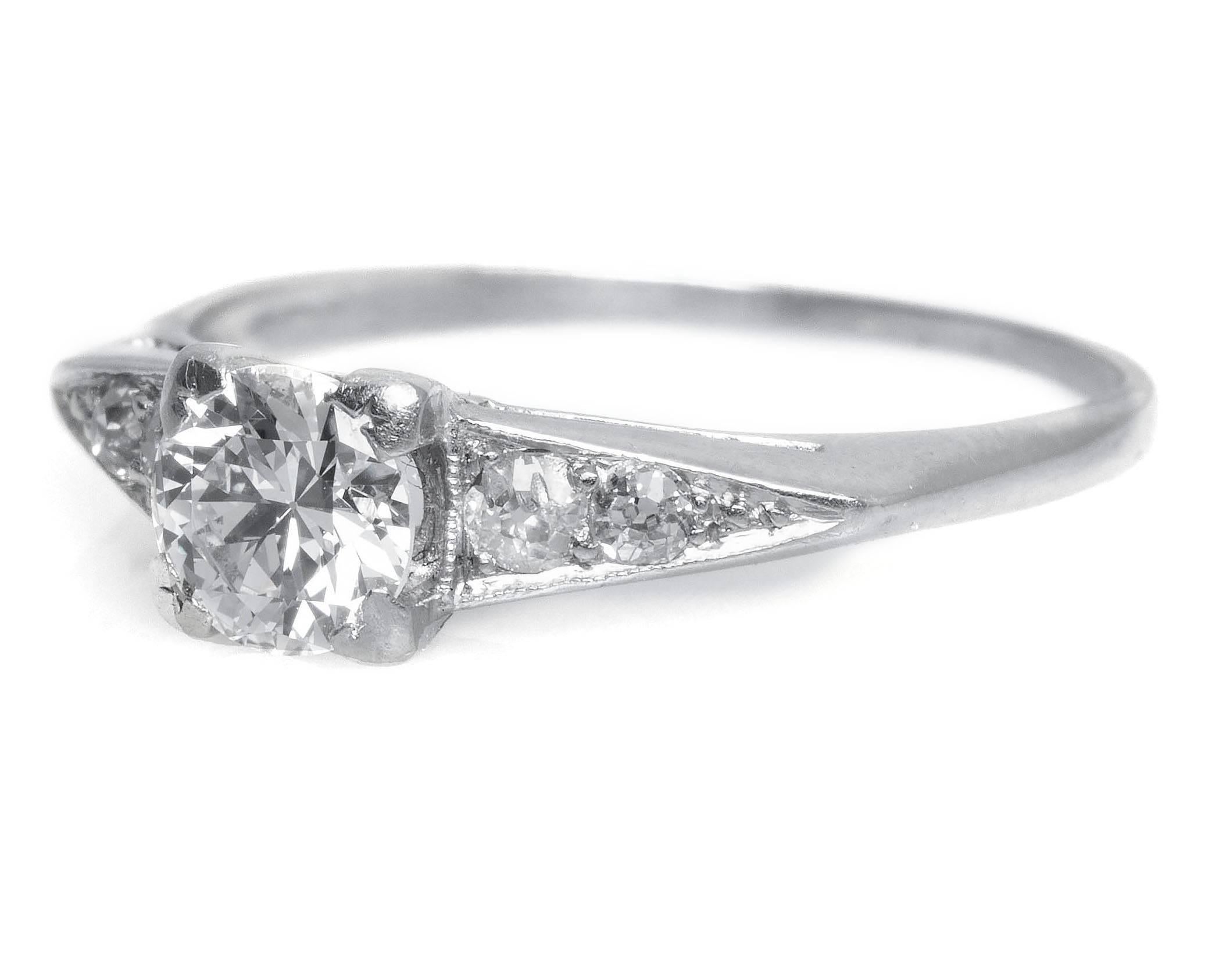 Item Details: 
Ring Size: 7
Metal Type: Platinum
Weight: 3.1 grams

Center Diamond Details
Shape: Old European Cut
Carat Weight: .60 carat
Color: I
Clarity: VS1

Side Stone Details: 
Total Carat Weight: .12 carat, total weight
Color: H
Clarity: