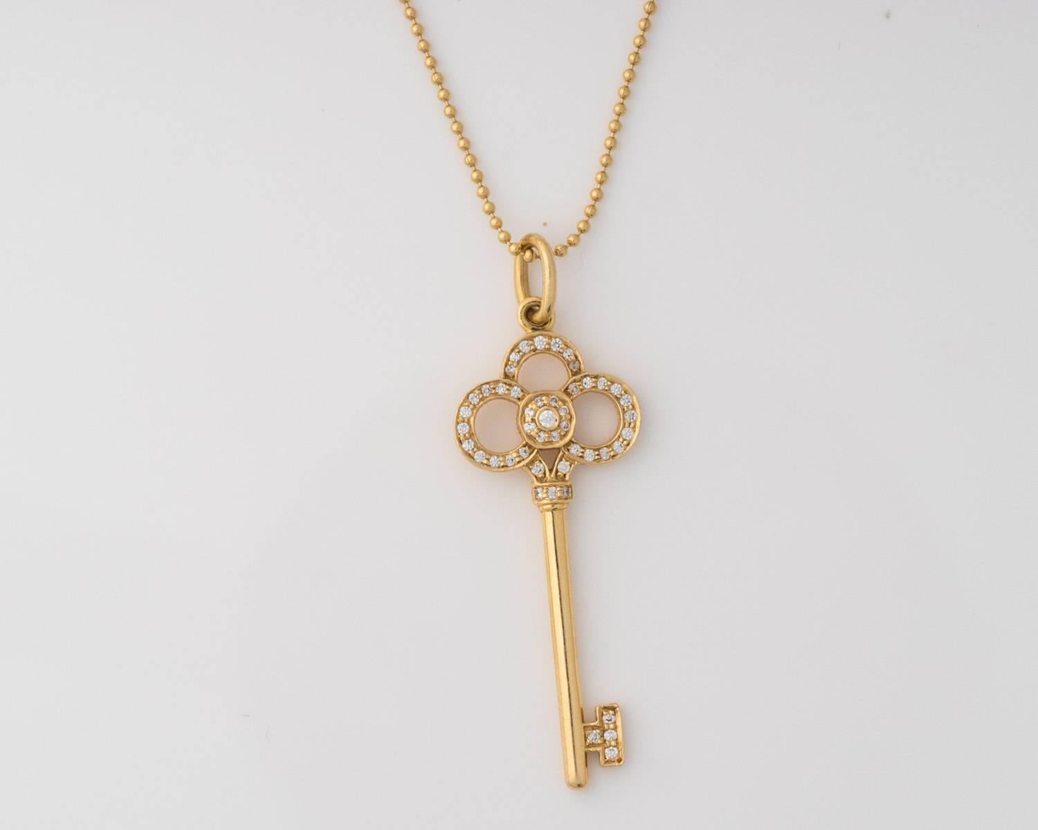 Tiffany & Co Crown Key Pendant Necklace
Forty Five Precision-Set Diamonds
Diamonds are 0.45 Carat Total Weight, G Color, VS1 Clarity
Crafted in 18 Karat Rose Gold 
Accompanied with 18 Karat Rose Gold Chain, measures 16 Inches

