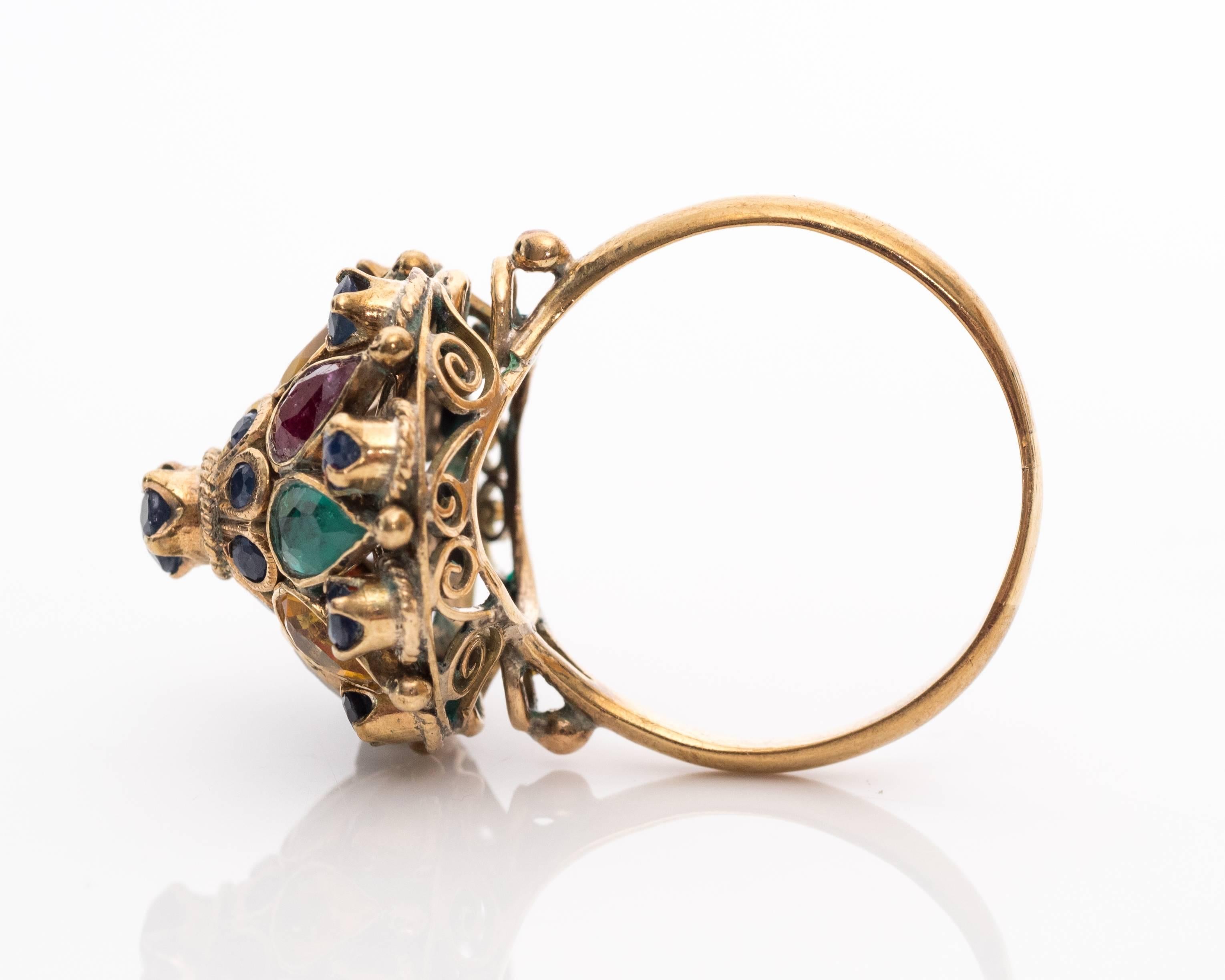 Gorgeous Multicolored and Multi-Gemstone 1940s Ring
Featuring Sapphires, Emeralds, Citrine, Amethyst, Garnet and Smokey Quartz
Lots of Color and Sparkle!

Top Tier features Sapphires, all Bezel Set 
Second Tier includes pear-shaped colorful