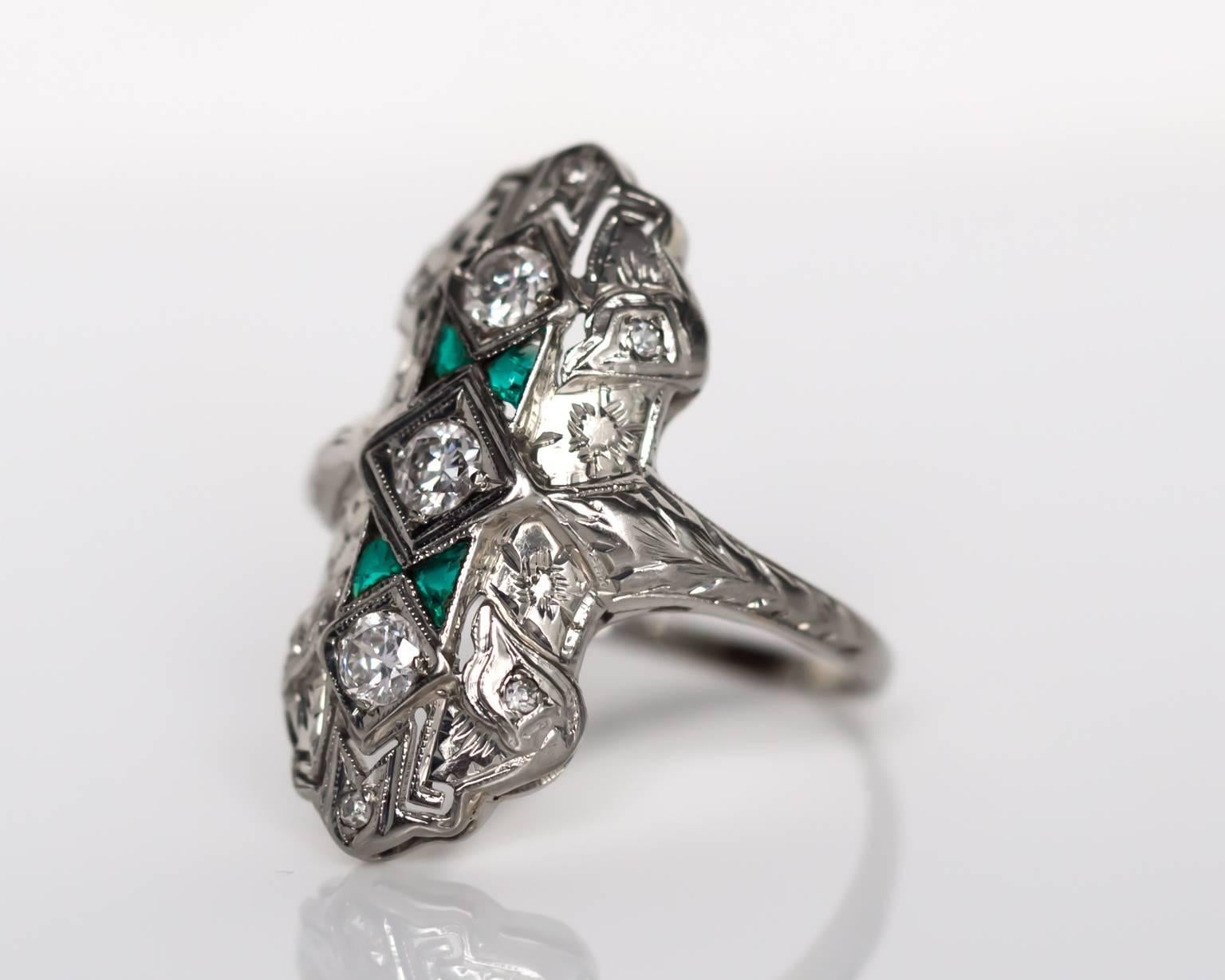 Item Details: 
Ring Size: 8.75
Metal Type: 20 Karat White Gold 
Weight: 4.9 grams

Diamond Details
Shape: Old European Cut
Carat Weight: .35 carat, total weight
Color: G-H
Clarity: SI

Color Stone Details: 
Type: Emerald
Shape: French Cut
Carat