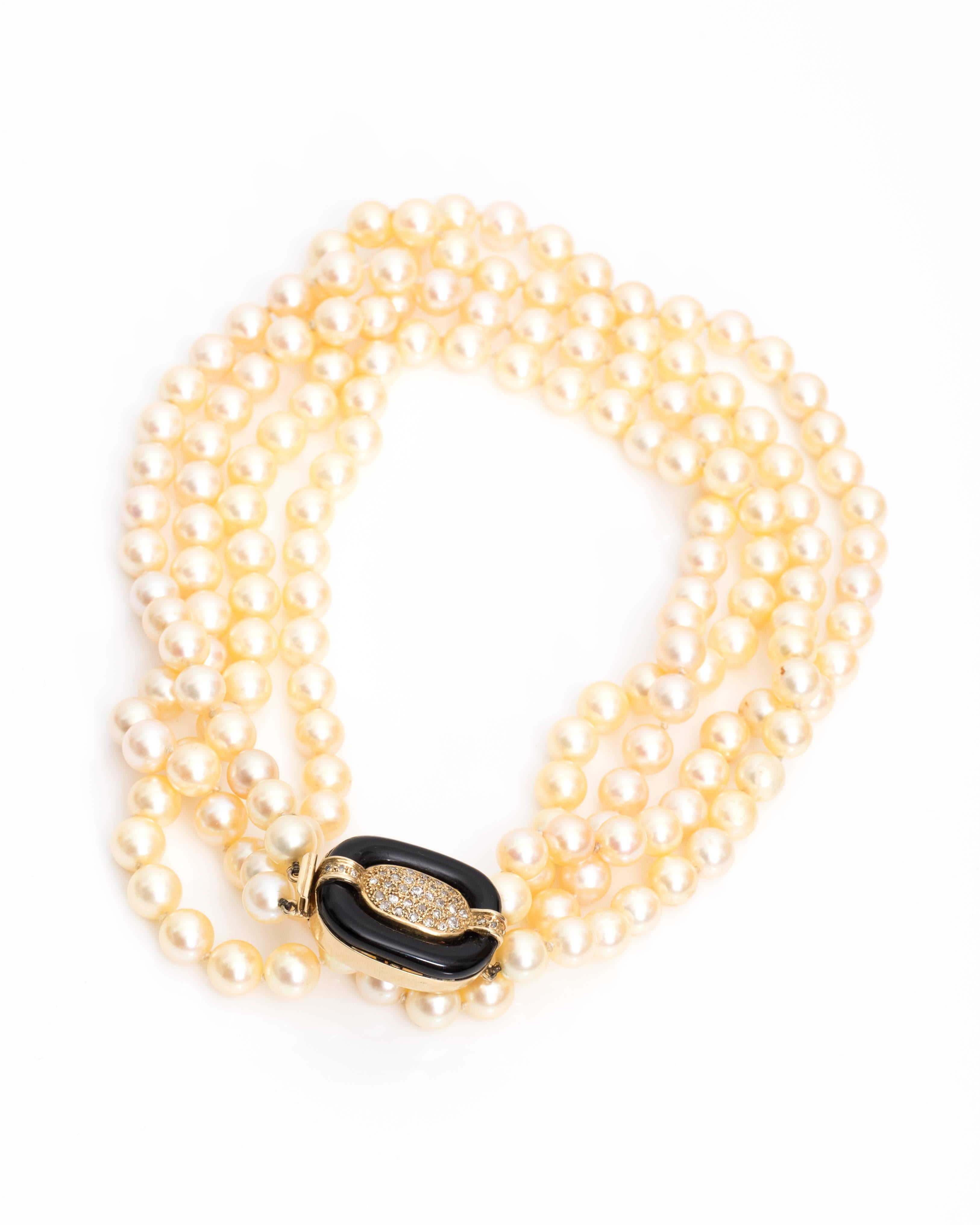 long pearl and gold necklace