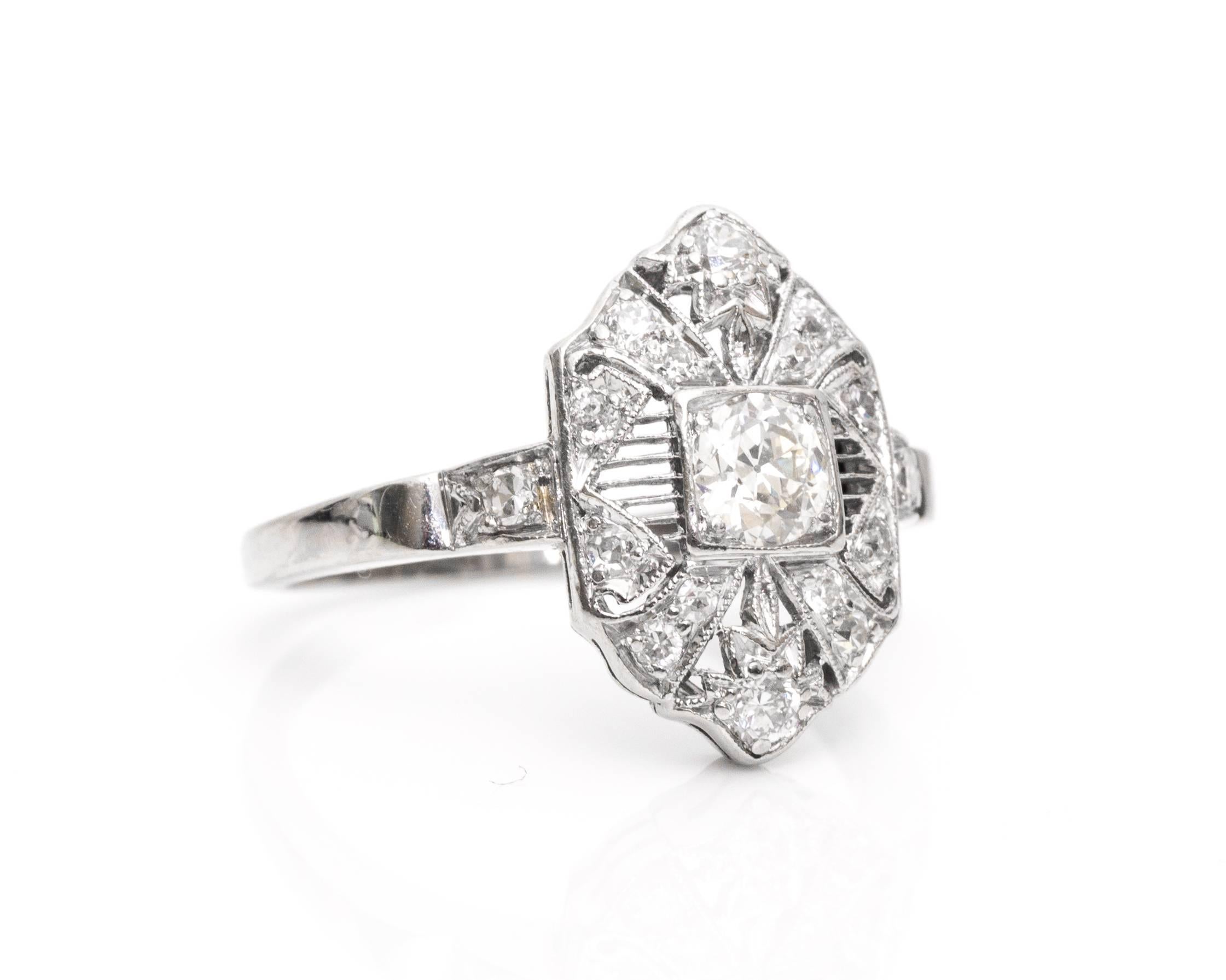 1920s Art Deco .45 Carat Old European Diamond Platinum Shield Ring
Fits Ring Size 5
Platinum Crafted Dainty Shield Ring 
Plenty of Sparkle and Ultra Shine from Diamonds
Mix of Old European and Single Cut Diamonds
Total Carat Weight 0.45 carats

All