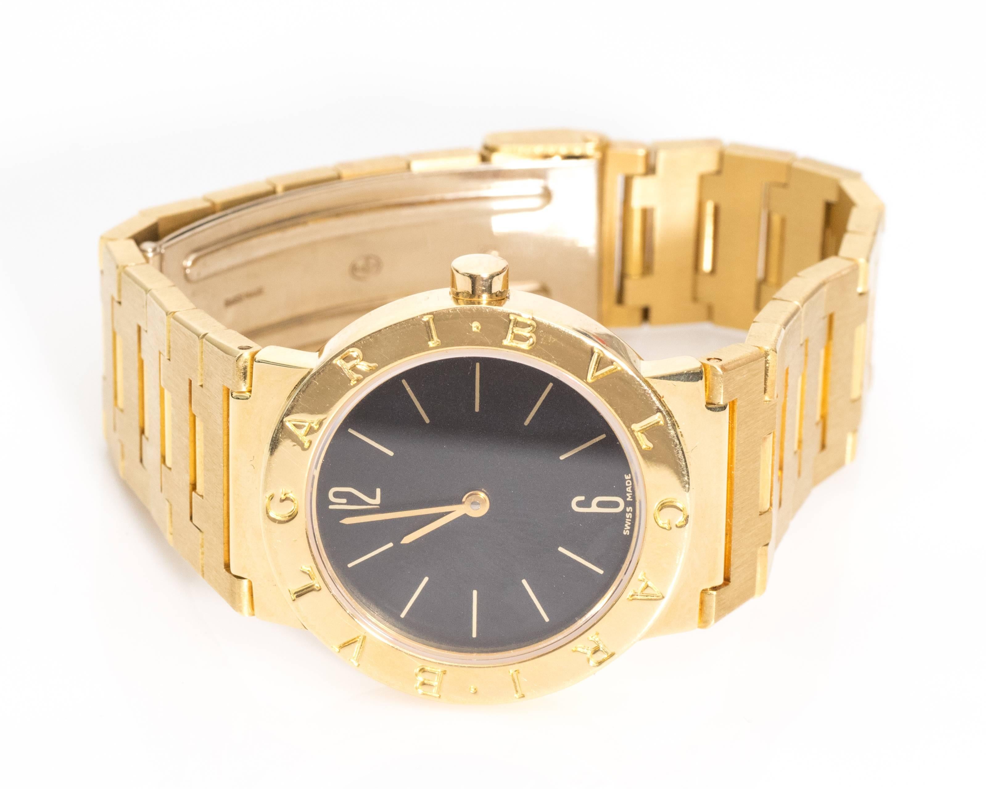 Bulgari 18 Karat Yellow Gold Ladies Bulgari Wrist watch 
Swiss Made
Fits up to a 7.15 inch Wrist
Accompanied with Original Box and 4 Removable Links 

Features:
12-Hour Dial
Movement
Analog Display
23 Millimeter Case Size

