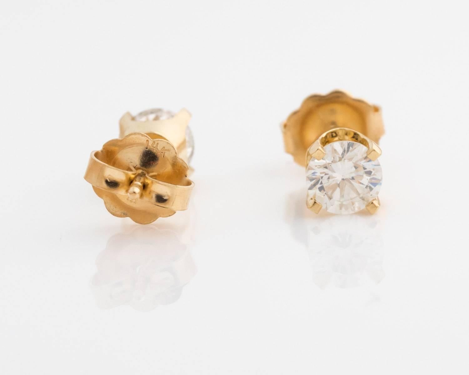 0.65 Carat Diamond and 14 Karat Yellow Gold Stud Earrings In Good Condition In Atlanta, GA