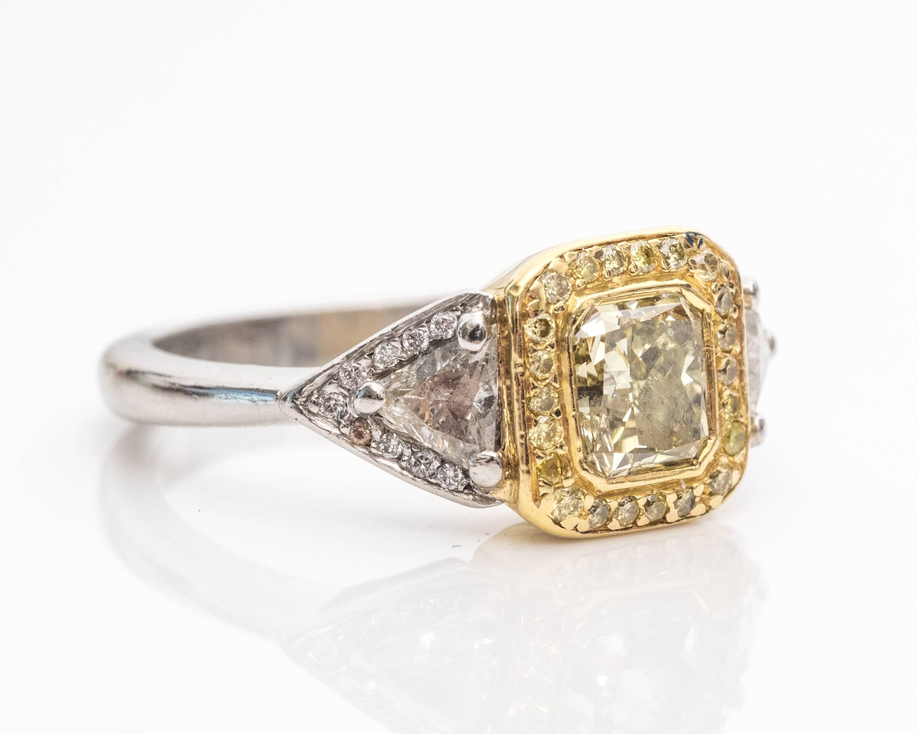 1.01 Carat Radiant Cut Fancy Yellow Diamond Platinum Gold Ring In Good Condition In Atlanta, GA