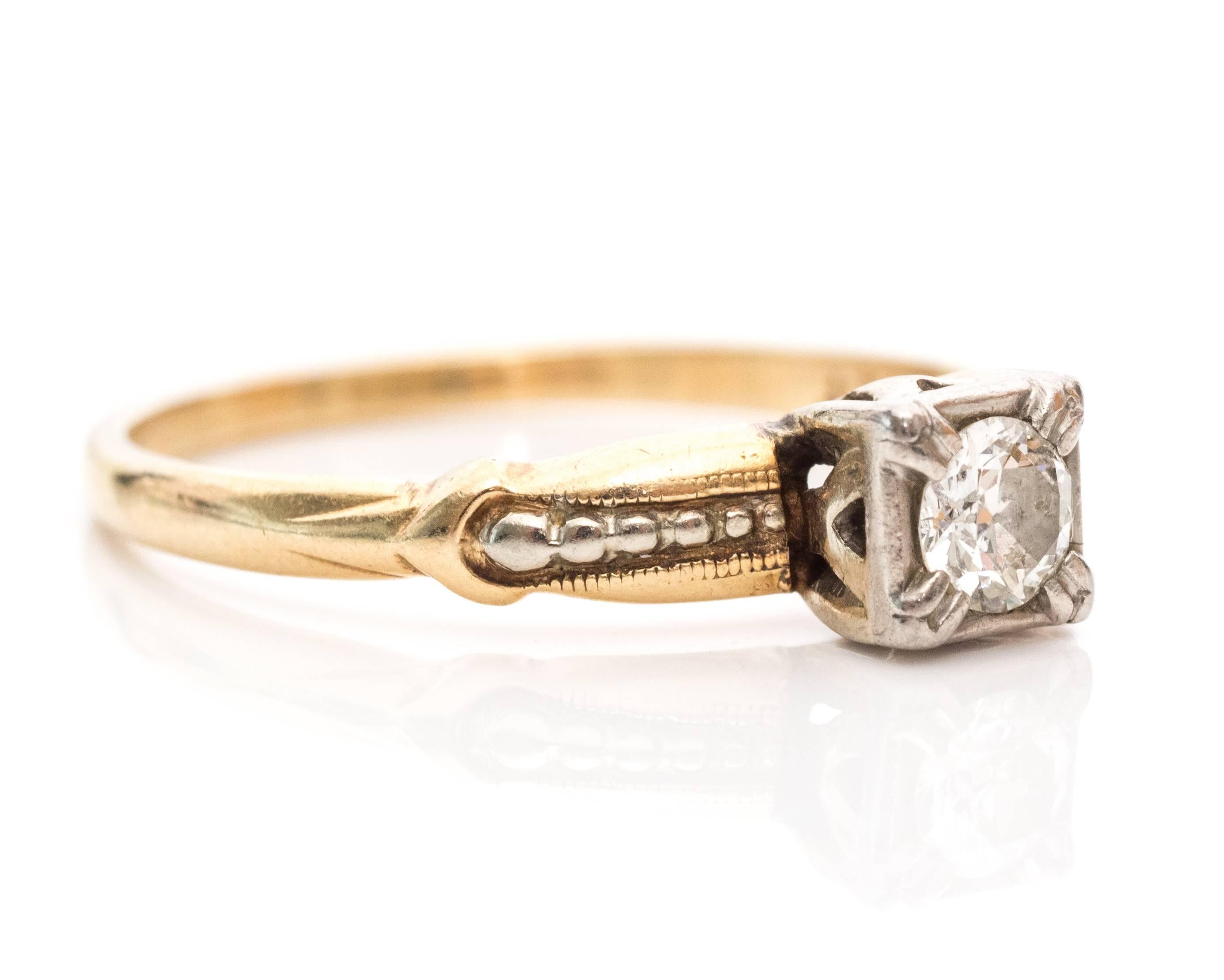 1930s Art Deco .20 Carat Old European Diamond Solitaire Engagement Ring
The solitaire has a high mounted diamond set in prongs similar to a fishtail set. The Old European diamond is .20carat. The mounting and middle shoulder accents are made of 14