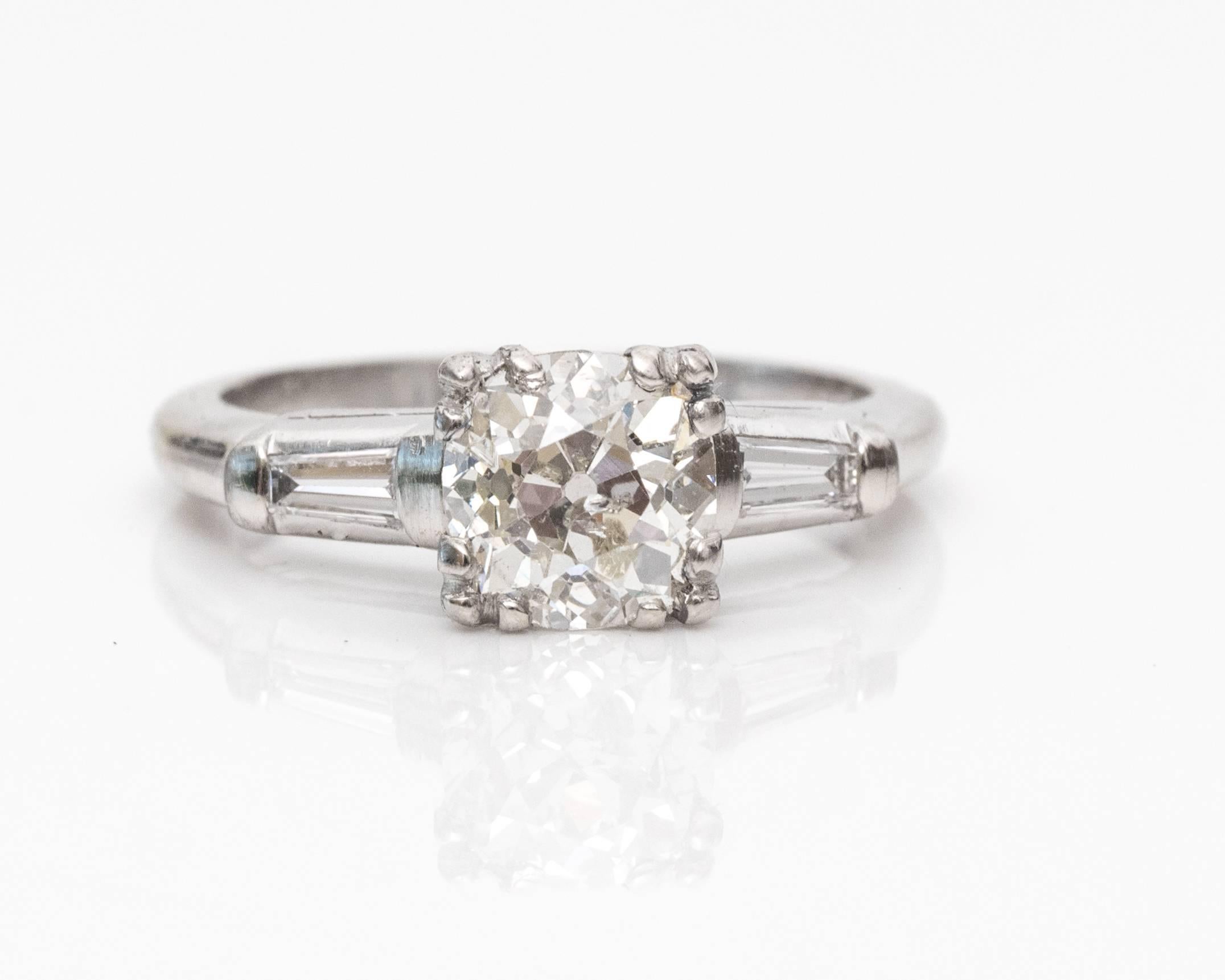1920s Art Deco 1.14 Carat GIA Certified Diamond Platinum Engagement Ring. This ring shines with simplicity and sophistication. The timeless style will last through the ages, just as it already has! This 1920s ring has a GIA certified center diamond