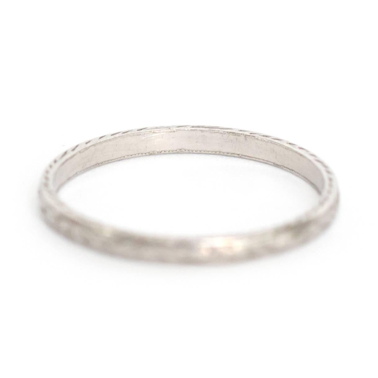 Item Details: 
Ring Size: 5.75
Metal Type: Platinum
Weight: 1.7 grams

Finger to Top of Stone Measurement: .97mm