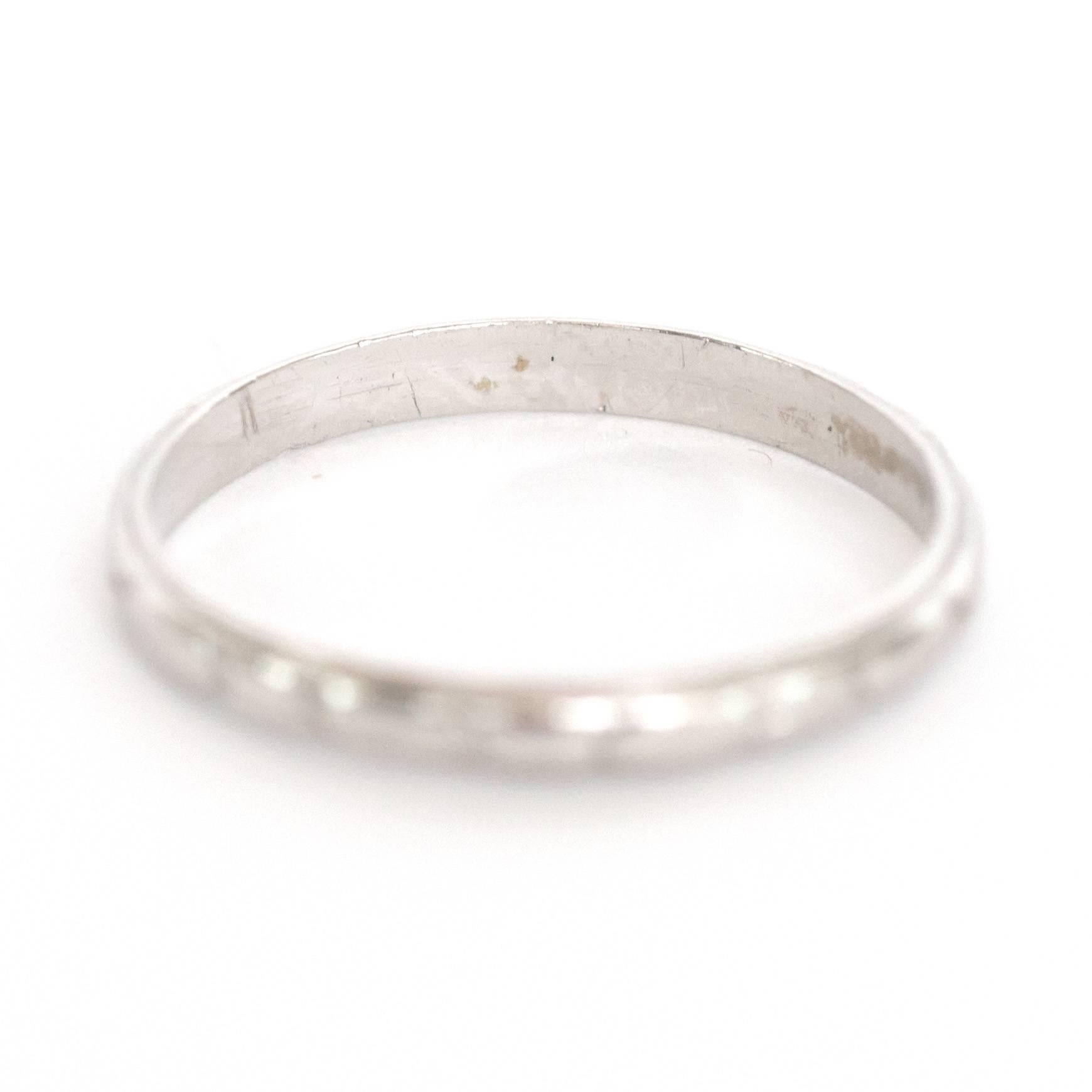 Item Details: 
Ring Size: 6
Metal Type: Platinum
Weight: 2.2 grams

Finger to Top of Stone Measurement: 1.06mm