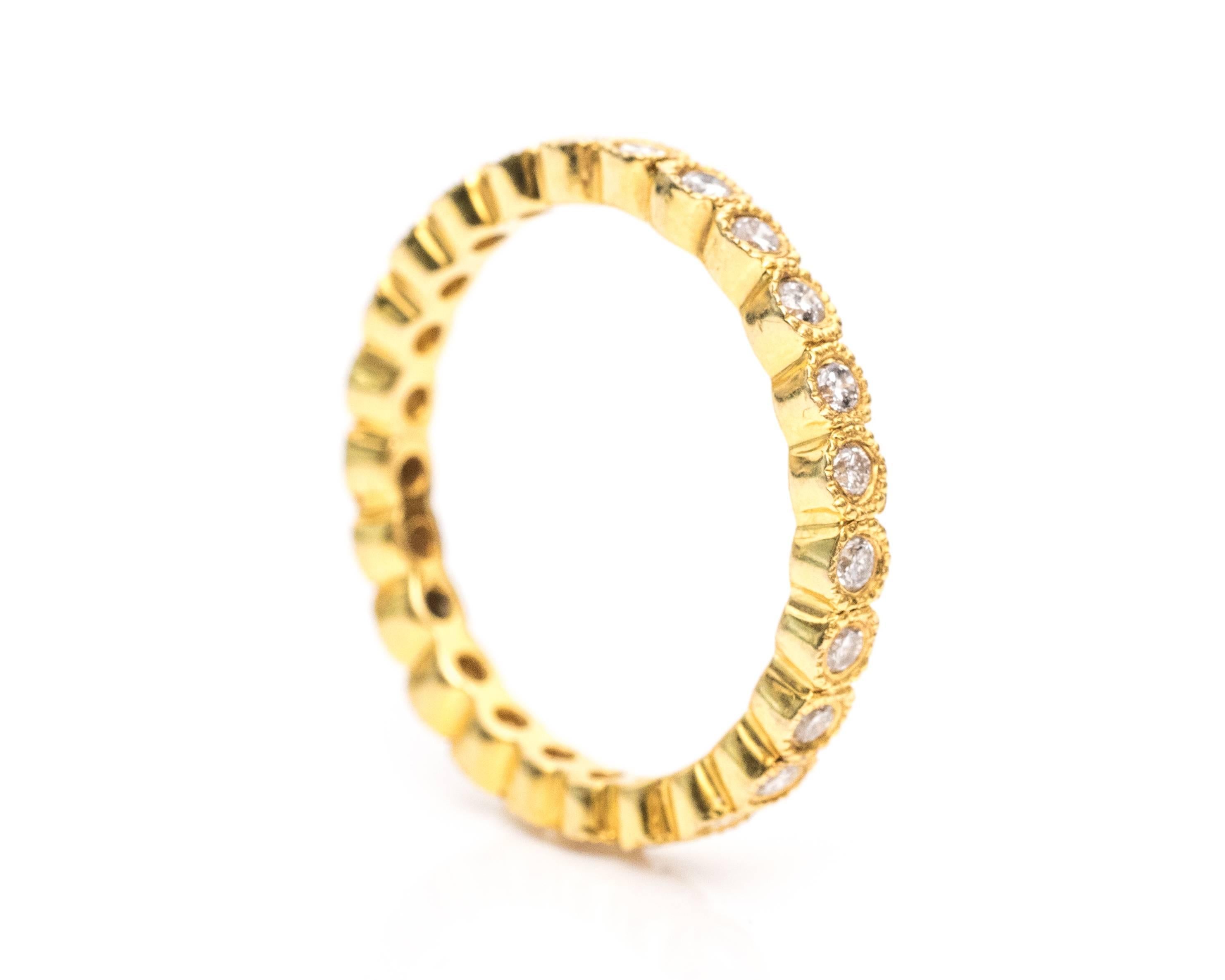 1990s Diamond and 14 Karat Yellow Gold Eternity Band Ring In Good Condition In Atlanta, GA