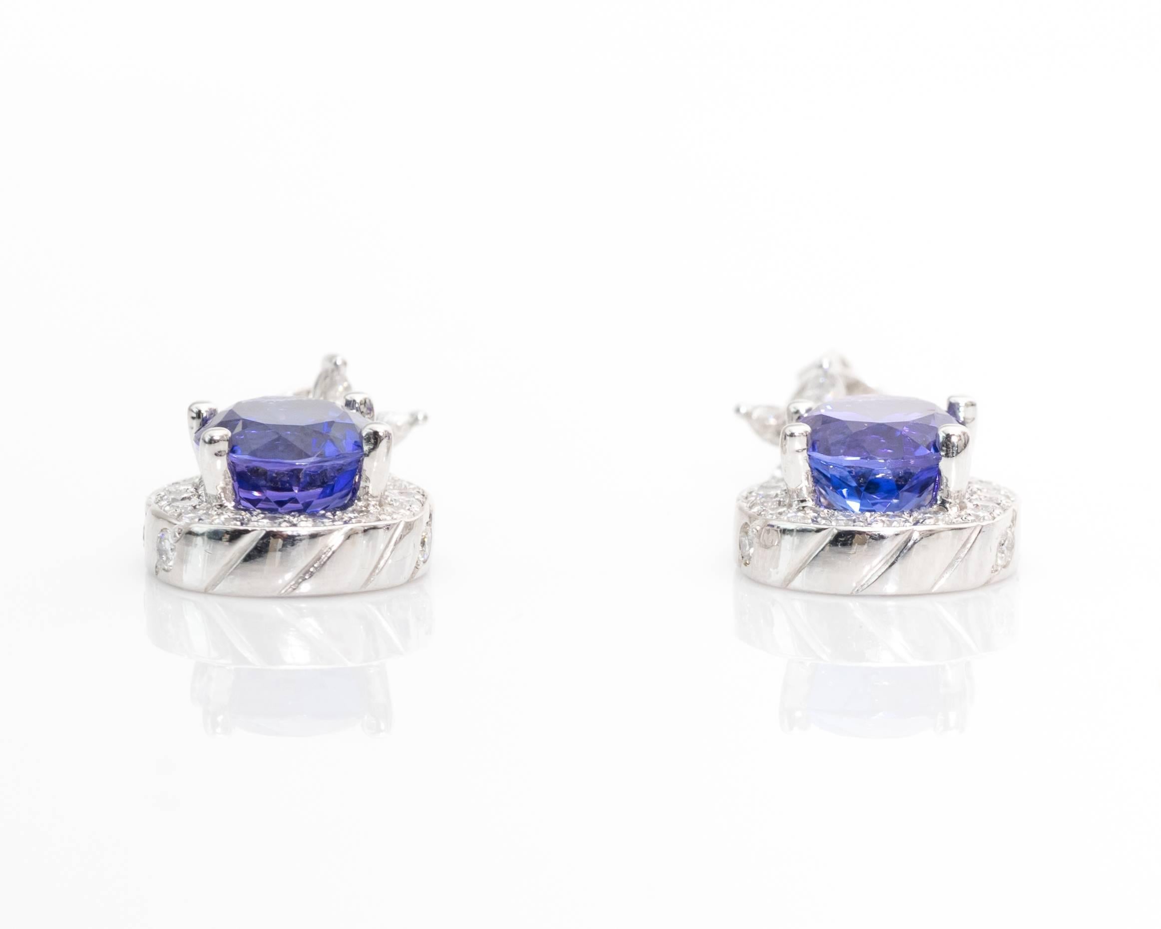 These stunning medium dark bluish purple oval tanzanite and star flower diamond in 18 karat white gold drop earrings are the perfect piece to make any occasion special. 


Earring Details:
Metal Type: 18 Karat White Gold
Weight: 8.9 grams

Center