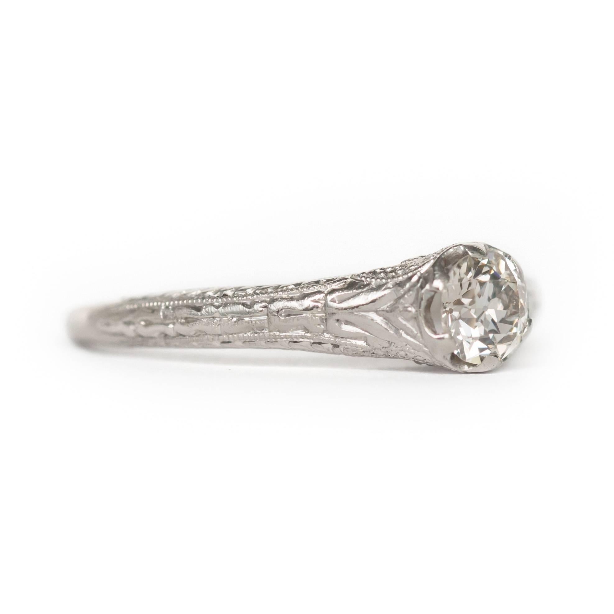 Item Details: 
Ring Size: Approximately 5.30
Metal Type: Platinum
Weight: 2.5 grams

Center Diamond Details:
Shape: Old European Brilliant
Carat Weight: .40 carat
Color: H
Clarity: VS

Finger to Top of Stone Measurement: 5.03mm

Engraving inside