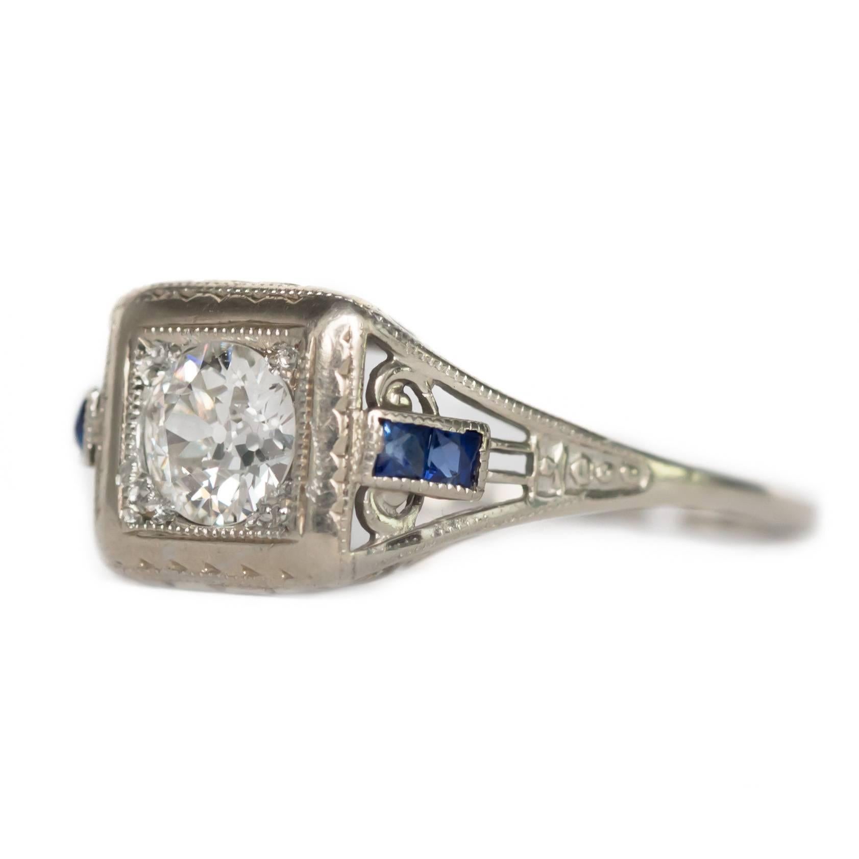 Item Details: 
Ring Size: Approximately 6
Metal Type: 14 Karat White Gold
Weight: 2.0 grams

Center Diamond Details
Shape: Old European
Carat Weight: .40 carat
Color: G
Clarity: SI1

Color Stone Details: 
Type: Sapphire
Shape: French Cut
Carat