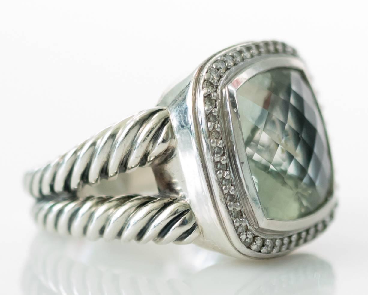 Designer David Yurman Albion Ring with Prasiolite and Diamonds

Metal Type: Sterling Silver
Ring Size: 6
Center Stone: Faceted Prasiolite, 17 X 17 millimeter 
Accent Stones: Pavé diamonds, 0.42 Carats Total Weight 
Ring is 21 millimeter Wide 
