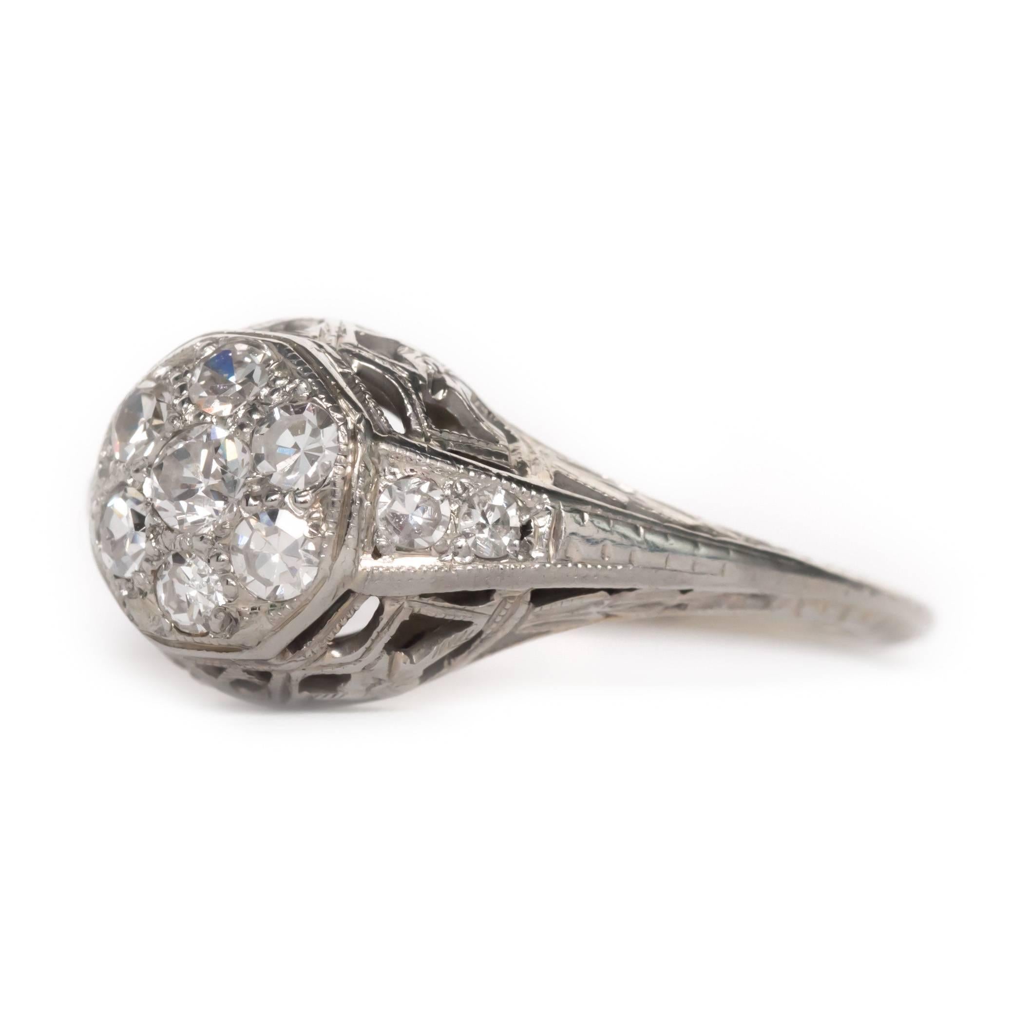 Item Details: 
Ring Size: Approximately 6.20
Metal Type: 18 Karat White Gold
Weight: 2.9 grams

Center Diamond Details:
Shape: Antique European Cut
Carat Weight: .25 carat, total weight
Color: F
Clarity: VS


Finger to Top of Stone Measurement: