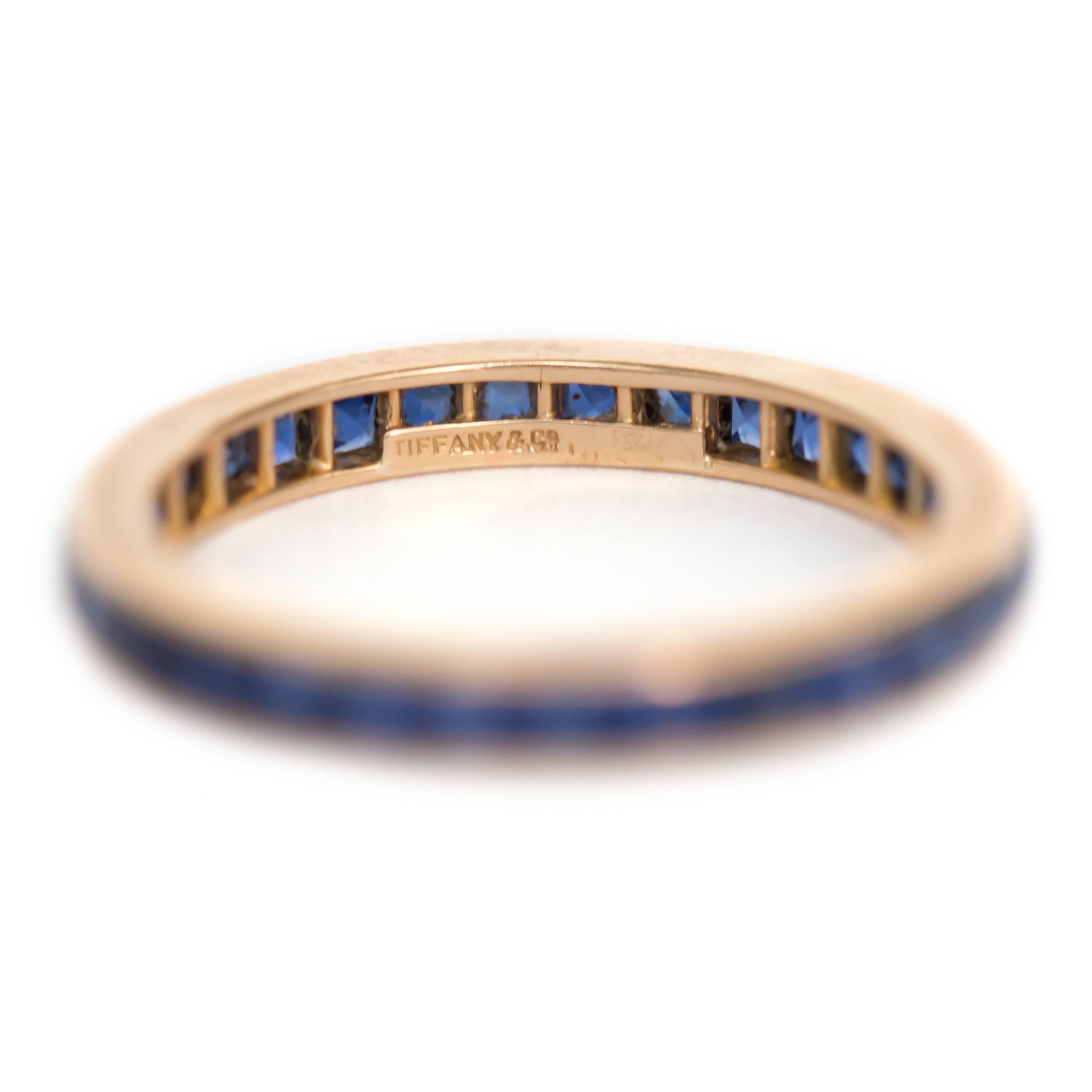 Item Details: 
Ring Size: 7
Metal Type: 18 Karat Yellow Gold
Weight: 2.0 grams

Color Stone Details: 
Type: Natural Sapphire
Shape: Square Step Cut
Carat Weight: 2.00 ct, total weight.
Color: Deep Blue

Tiffany & Co.

Finger to Top of Stone