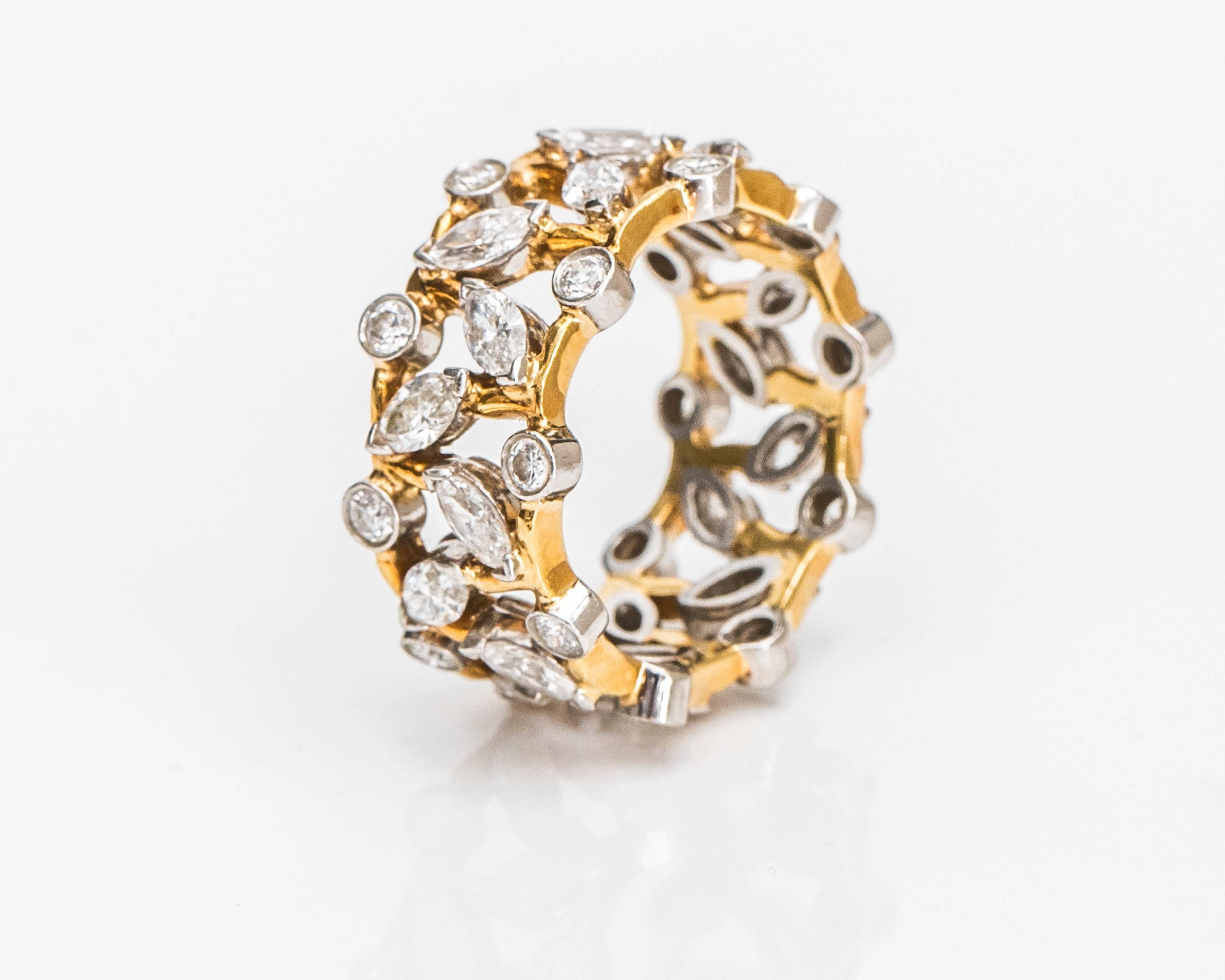 Intricate and stunningly elegant, this Tiffany and Co Diamond Platinum and 18 Karat Yellow Gold Ring is a Jean Schlumberger timeless original design. The world's most fashionable women, including Jacqueline Onassis and legendary Vogue editor Diana