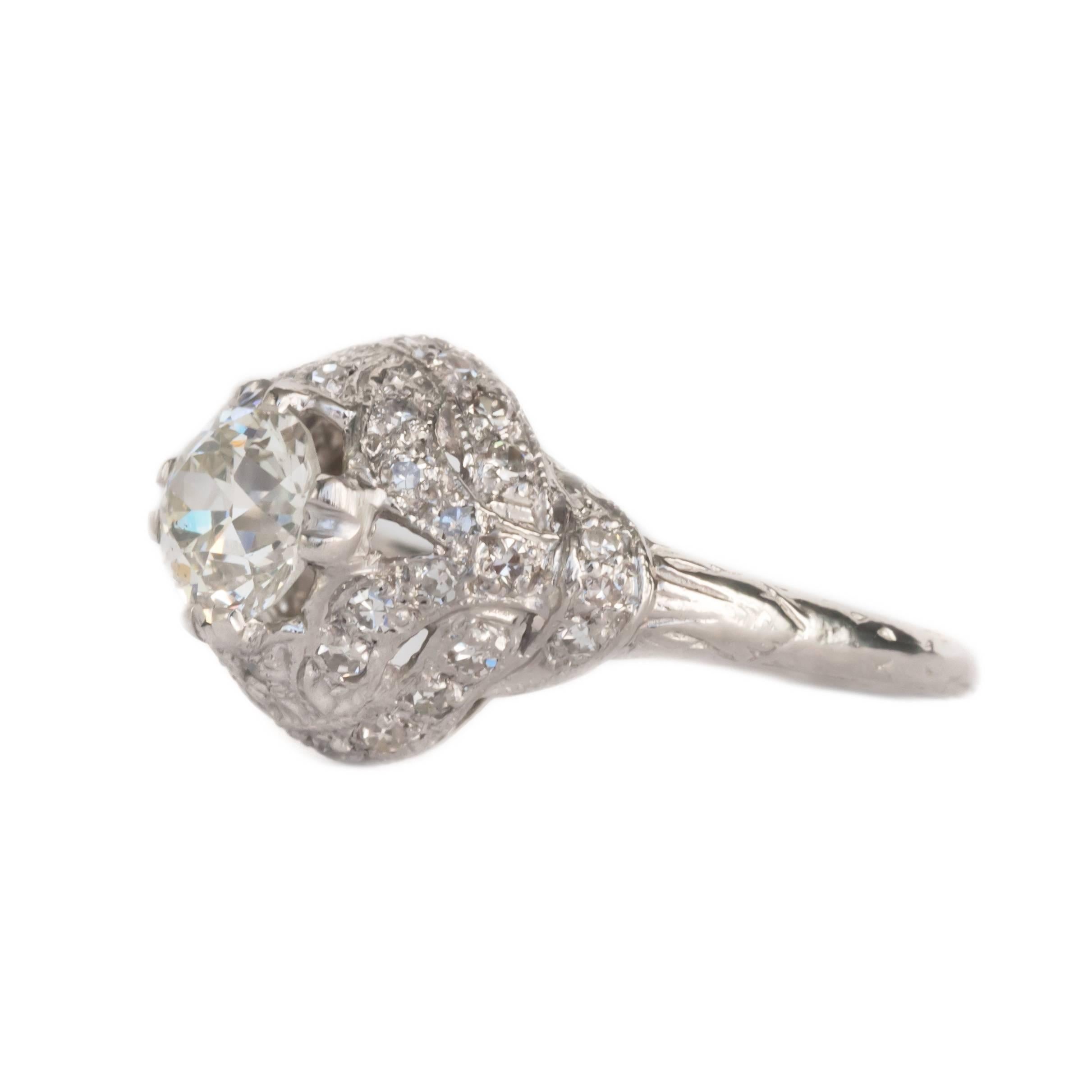Item Details: 
Ring Size: 7
Metal Type: Platinum
Weight: 4.4 grams

Center Diamond Details
GIA CERTIFIED Center Diamond - Certificate # [2185886210] 
Shape: Old European Brilliant
Carat Weight: 0.97 carat
Color: J
Clarity: SI2

Side Stone Details: