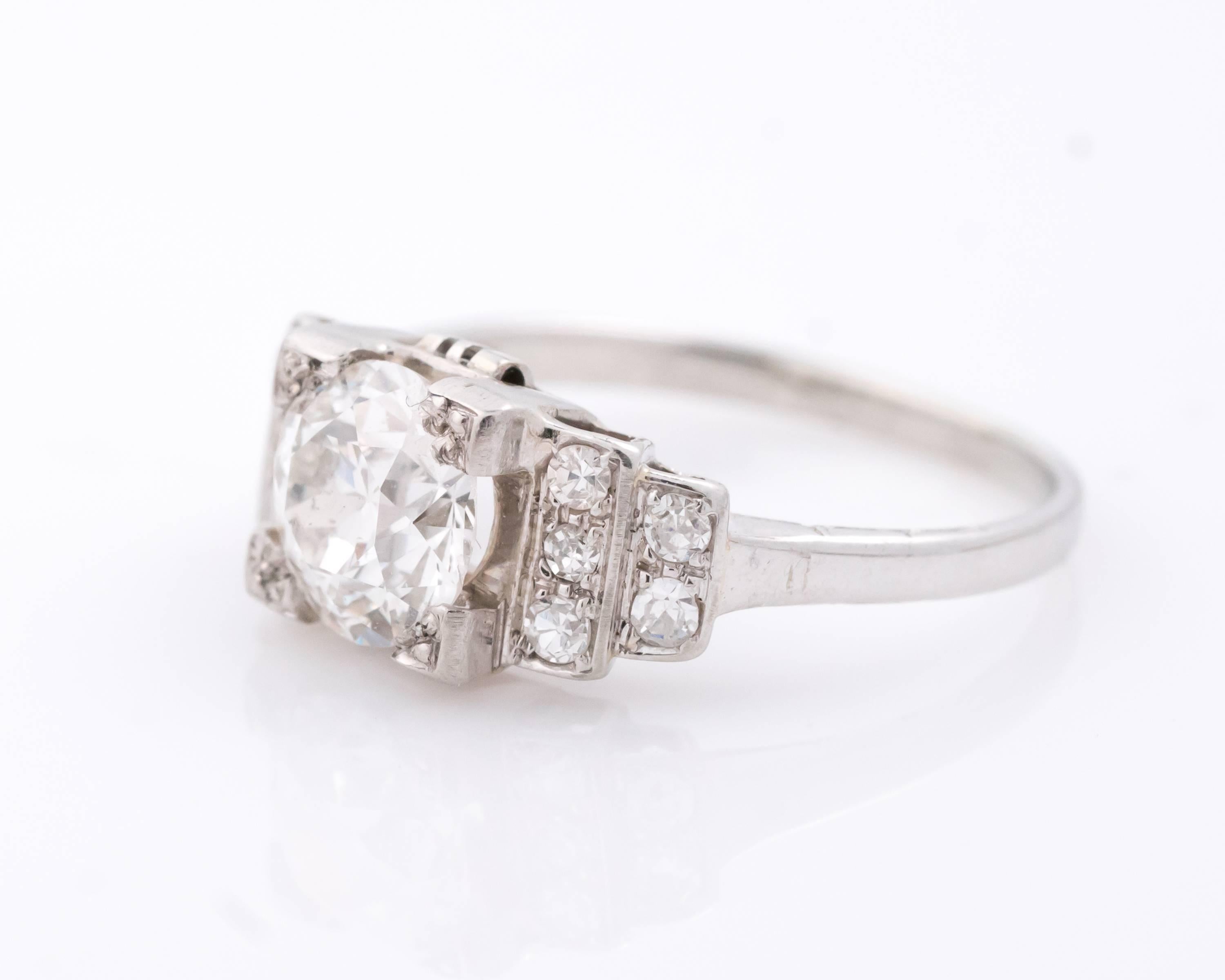 1930s 1.20 Carat Old European Diamond 18 Karat White Gold Engagement Ring. Features a 1.20 carat old european diamond with additional sparkling single-cut diamonds adorned in a cathedral 18 karat white gold setting. The center stone (1.20 carats) is