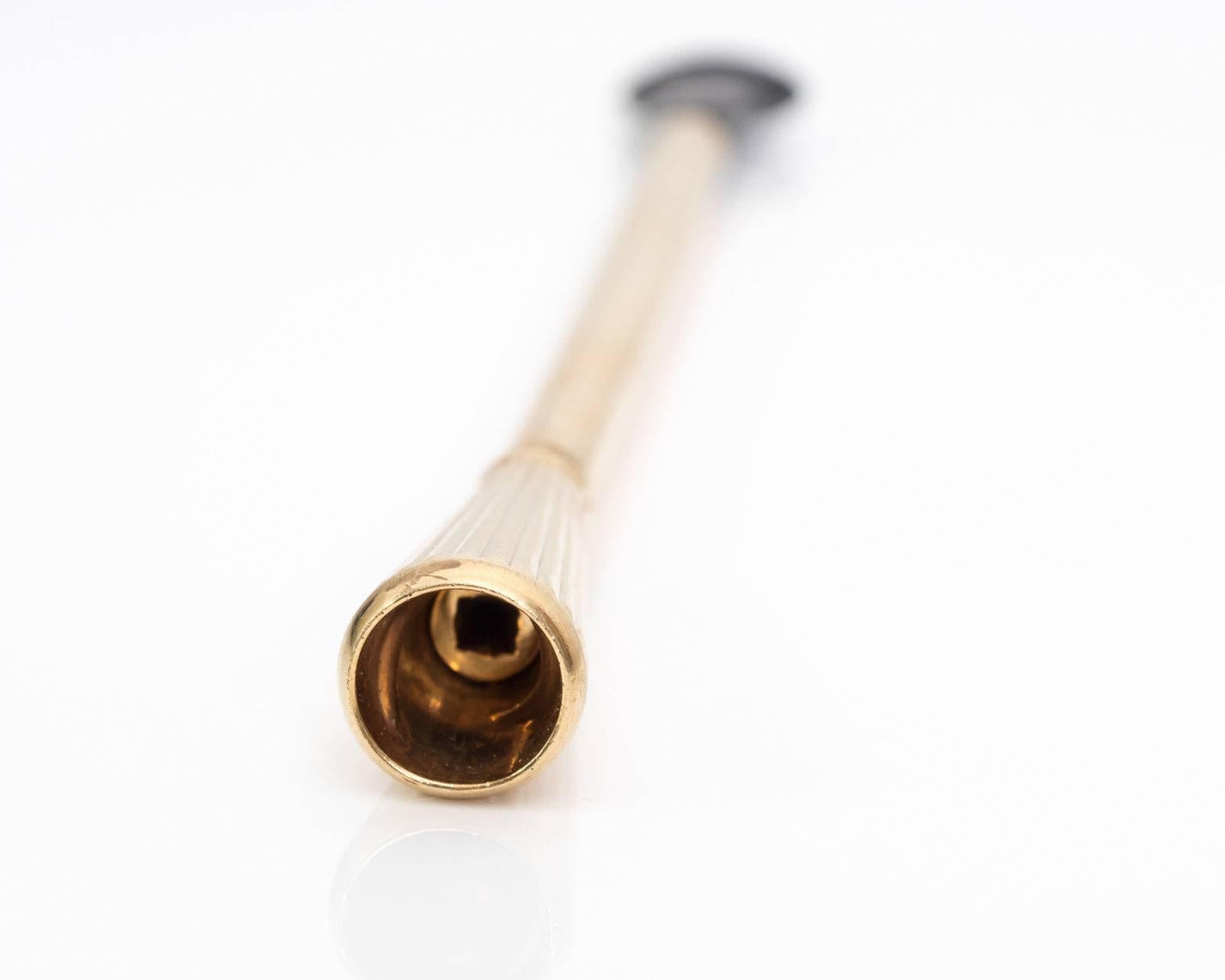 Get the Gatsby look with this accessory! It's perfect for smokers, costumes and fancy occasions. The stick is made of 9 Karat Yellow Gold with the Hallmark 