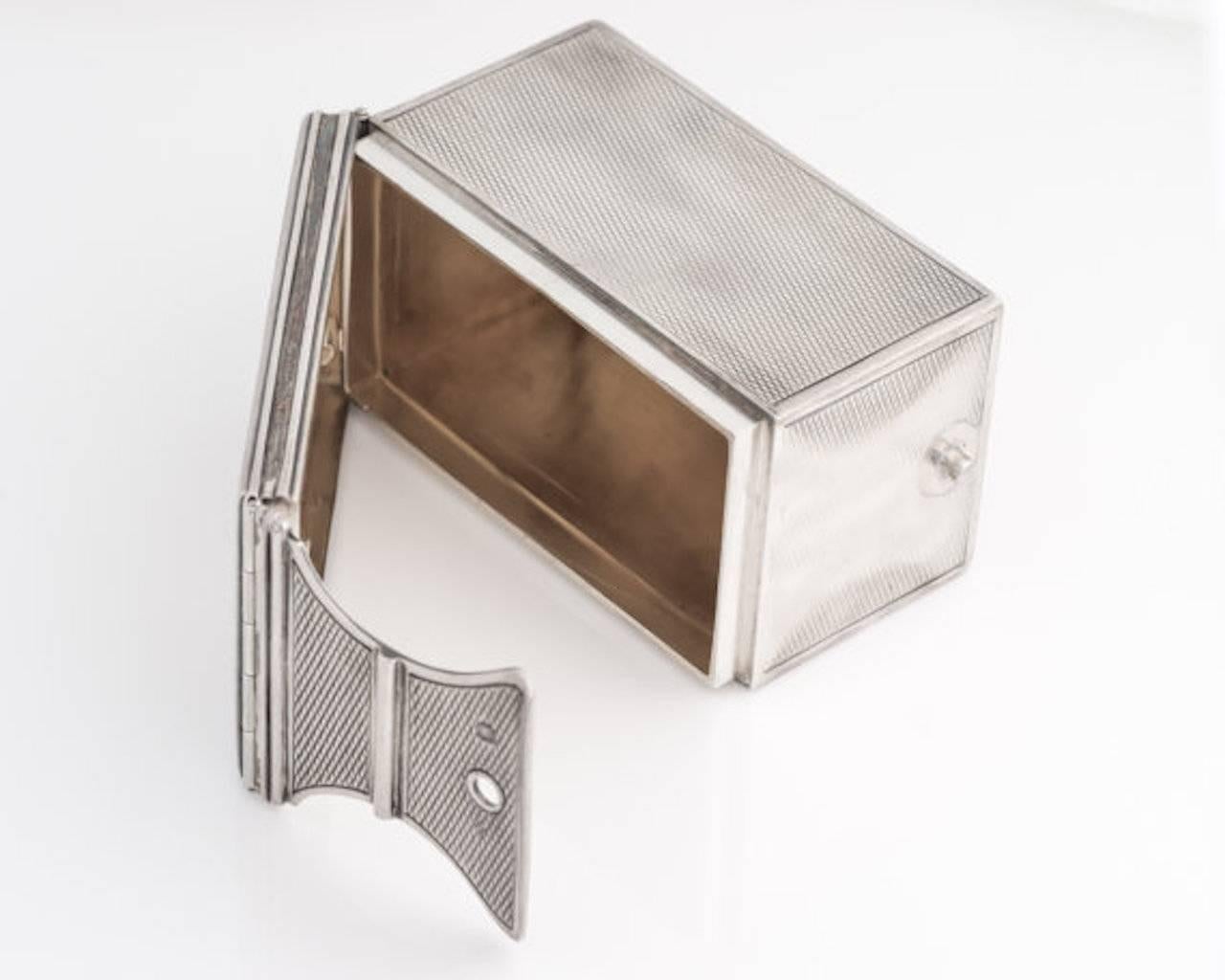Authentic G. Keller Paris silver! This famous silversmith made silverware and accessories in Paris in the 1920s. He handmade this intricate box with a cursive monogram on the top of the box. 

The silver has a diamond pattern on the surface of each