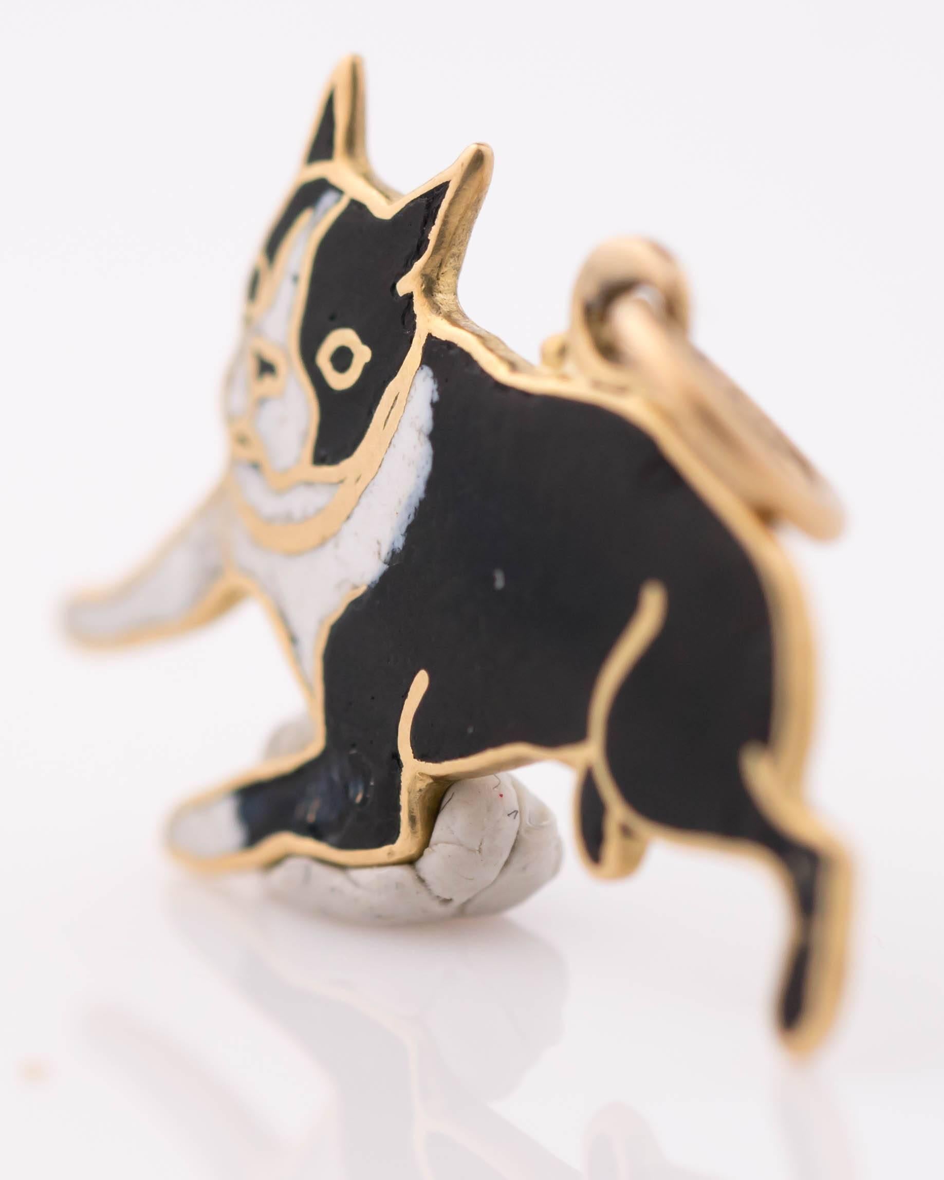1950s Boston Terrier Dog Charm Pendant - 14 Karat Yellow Gold, Enamel Cloisonne

Features Beautifully Hand Detailed Gold Work over Black and White Enamel. This 14 Karat Gold charm depicts a sweet Boston Terrier in repose. Black Enamel covers the