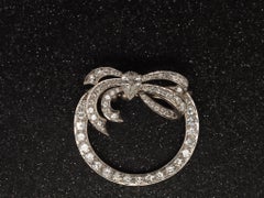 Platinum 1940s Gia Pear Shape & Round Diamond Ribbon Brooch