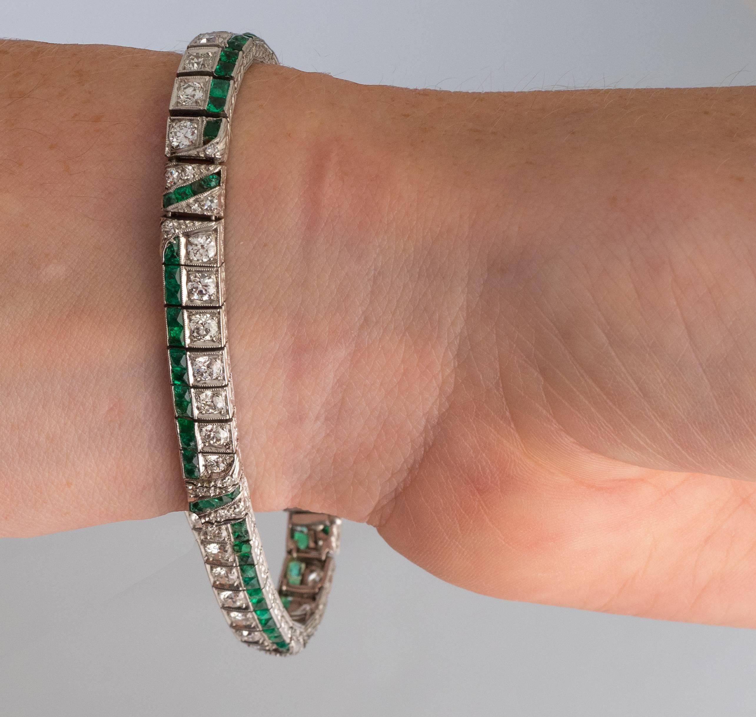 Circa 1920s Art Deco 3 Carat Emerald and 5.2 Carat Diamond Platinum Bracelet For Sale 1