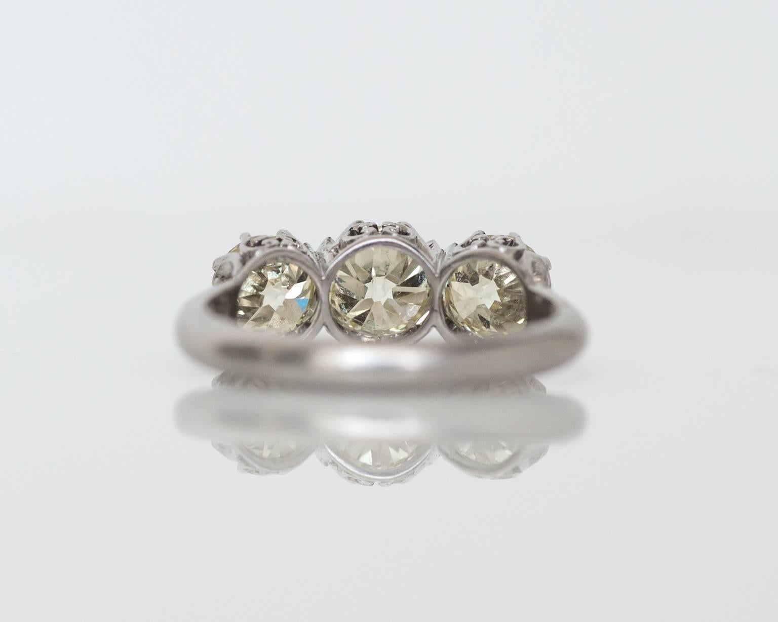 Here is a beautiful and extremely well made true vintage engagement ring. It is signed on the interior 