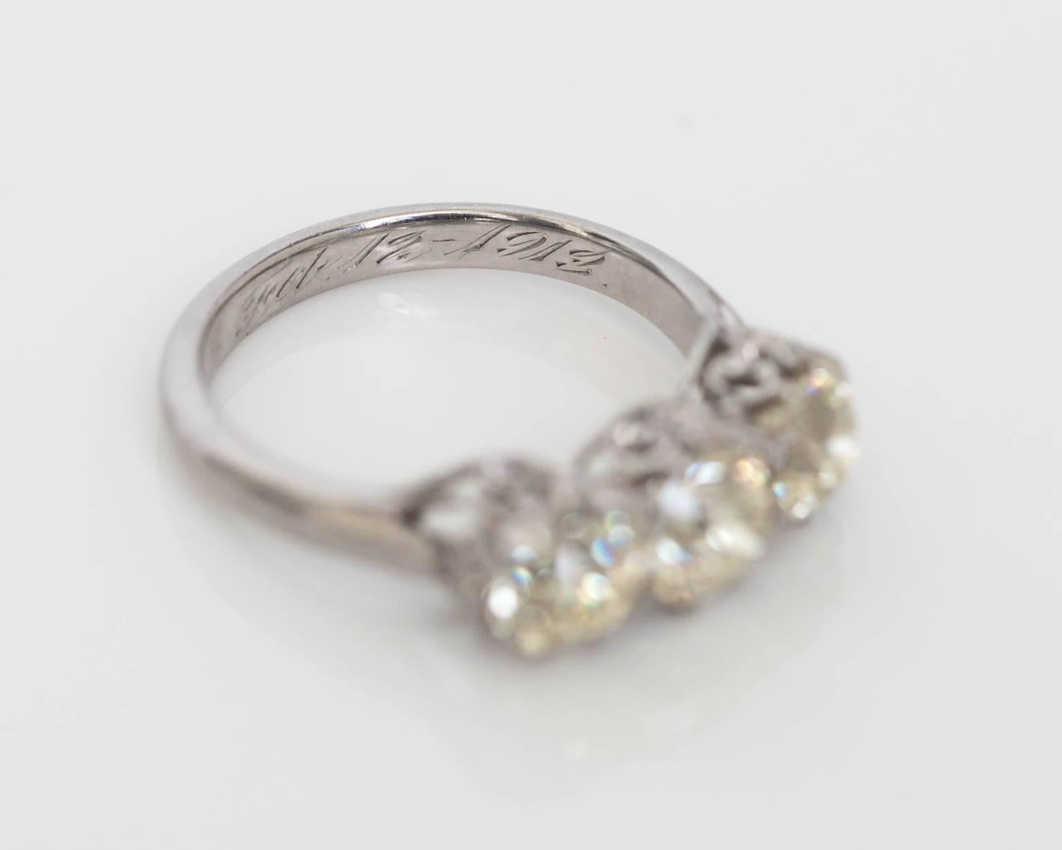Circa 1913 Old European Cut Diamond Platinum 3 Stone Engagement Ring In Excellent Condition In Atlanta, GA