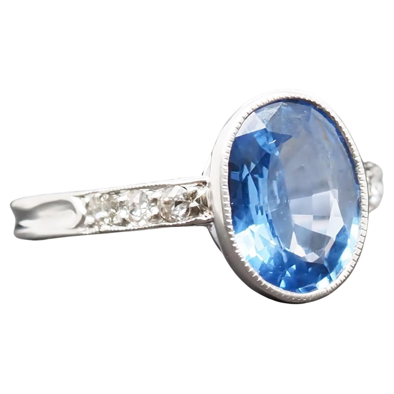 Year: 1920s

Item Details:
Ring Size: 5.25
Metal Type: Platinum [Hallmarked, and Tested]
Weight: 3.2 grams

Sapphire Details:

GIA Report #5212416100

Weight: 2.42ct

Measurement: 9.83mm x 7.56mm x 3.79mm

Type: Natural Sapphire, Unheated, Blue
