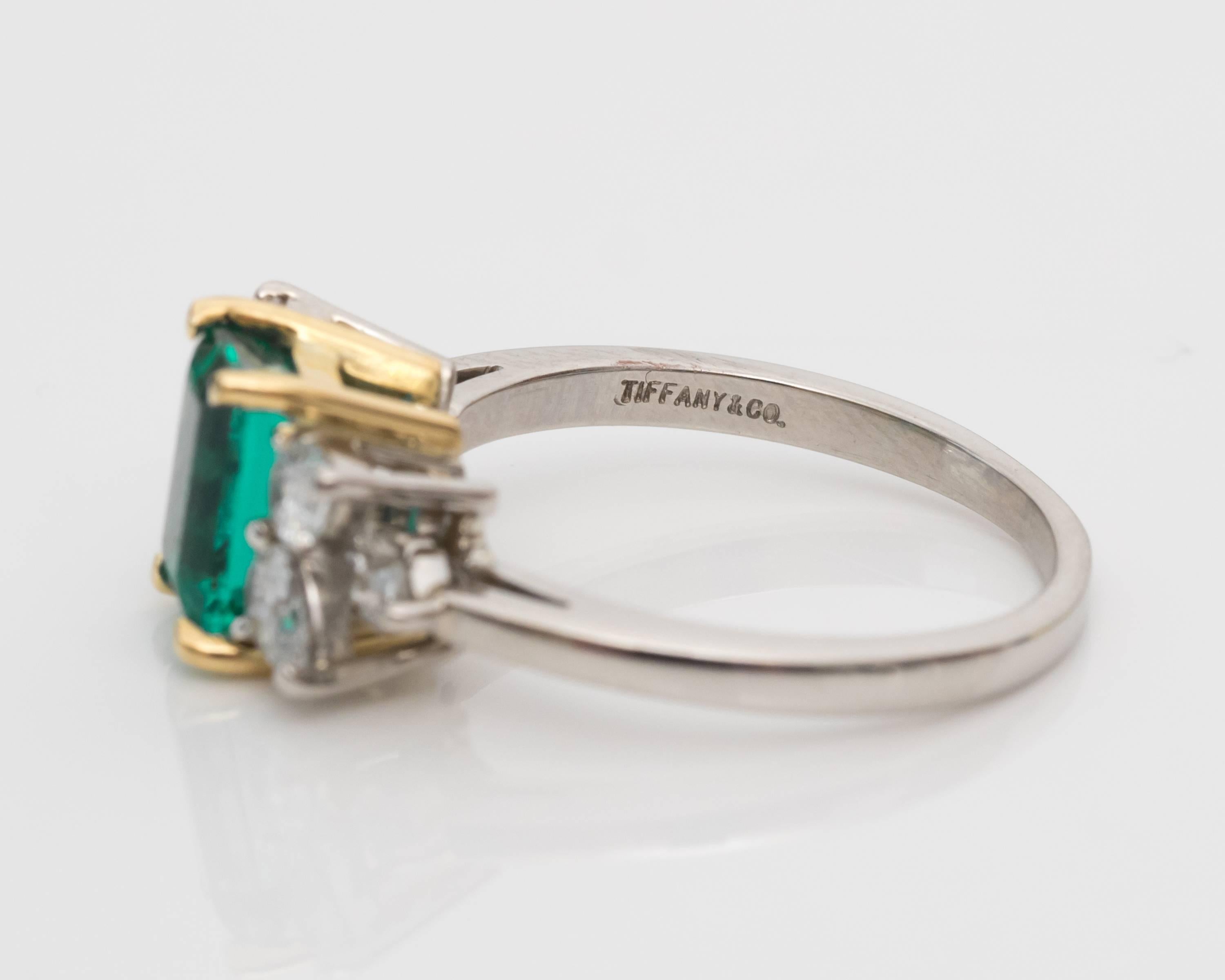 
1980s Tiffany & Co. 1ct Emerald and Diamond Platinum & 18k Yellow Gold Engagement Ring
1980s Tiffany & Co Engagement Ring featuring 1 carat Emerald and .50 carat total weight Diamonds
Two-Tone, Platinum and 18 Karat Yellow Gold

Authentic Tiffany &