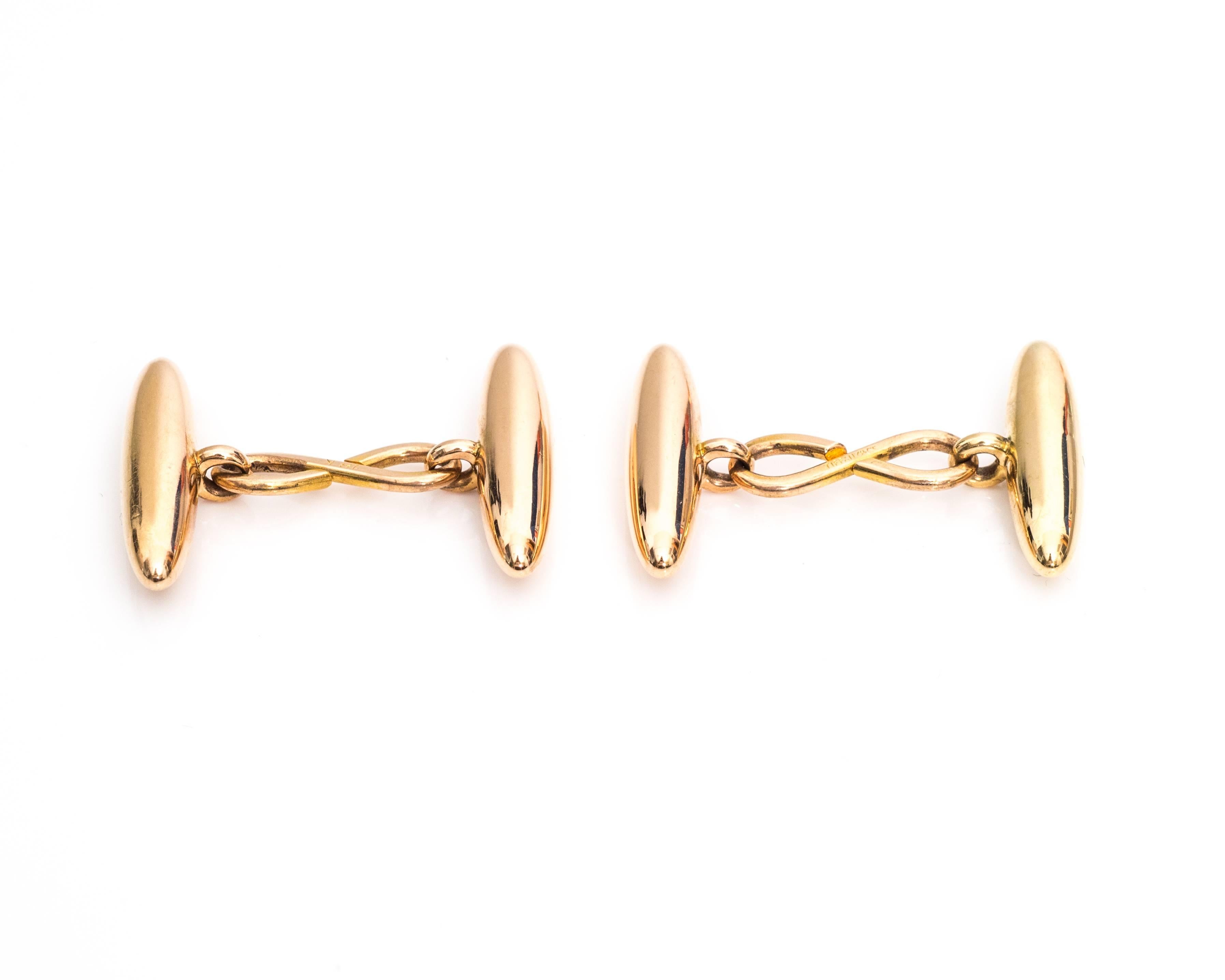Absolutely Stunning 1950s Tiffany & Co. Cufflinks
Crafted in 18 Karat Yellow Gold with Strong Rose Patina
Features a Long Marquise Shaped Cylinder that connects to a Classic Toggle Style Link
Each Cufflink is Hallmarked 18KT and TIFFANY AND CO 