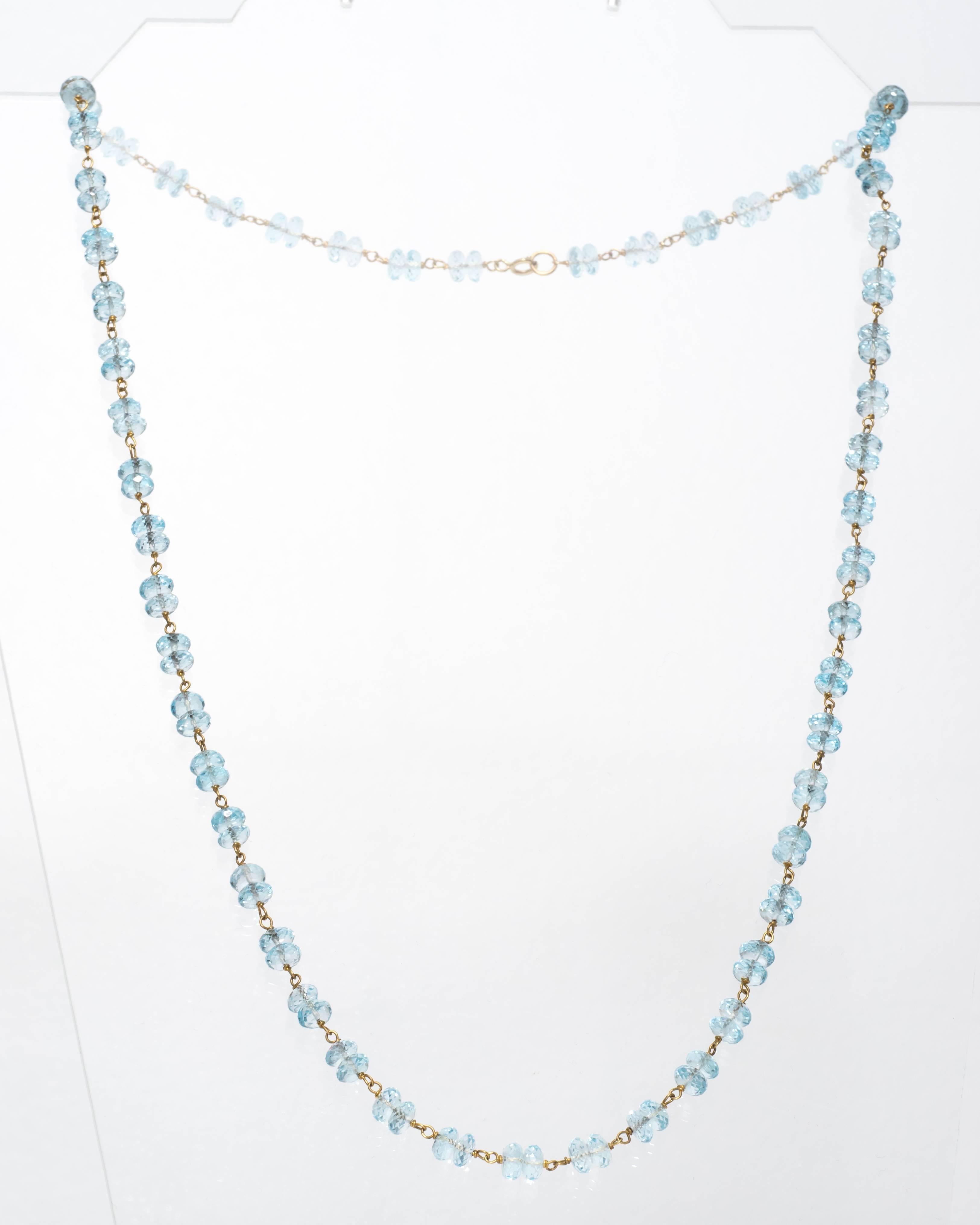 1960s Briolette Blue Topaz 
These three strands are sold together. The strands can be sold separately as well - Please inquire via messages to get individual strand pricing!

Each is a different length, but all long strands. The blue topaz disks