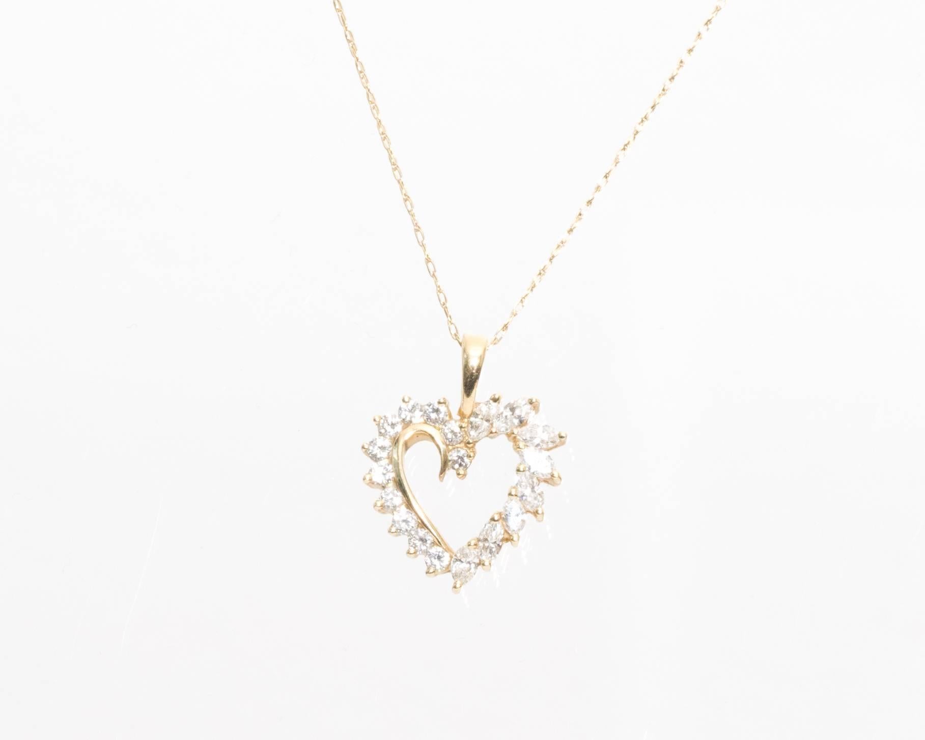 1950s Heart shape Diamond Pendant with a 19-Inch Chain
Custom Made
Crafted in 14 Karat Yellow Gold

Heart Shape Pendant features 0.75 carats total of Diamonds
F-H Color, VS-SI Clarity
11 Round Brilliant Cut Diamonds make up half of the pendant (on