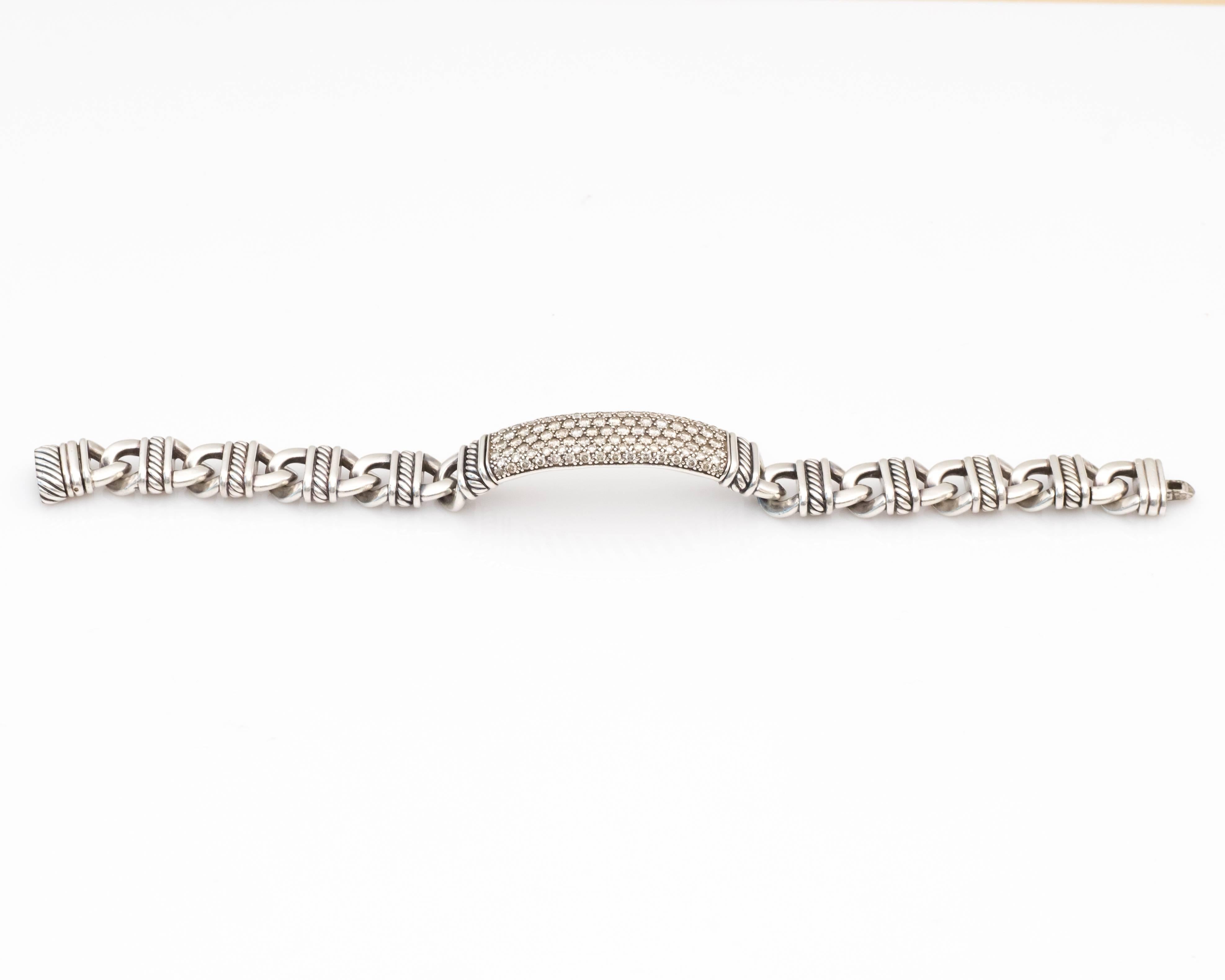 Iconic Designer David Yurman Bracelet from 1990s
Crafted in Sterling Silver

Center of Bracelet is encrusted in diamonds, weighing a total of 4.5 Carats of Diamonds, all Round Brilliant, F-J Color, VS-SI Clarity.
Total of 109 diamonds. 

Remainder